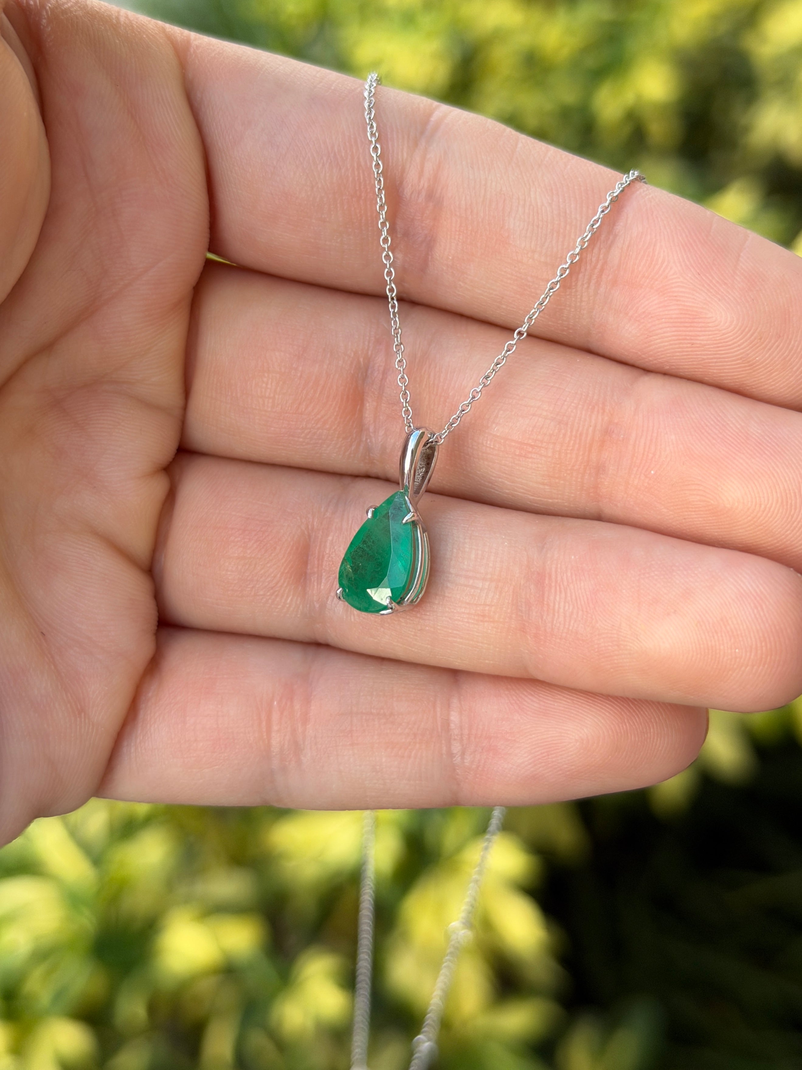 Natural pear-shaped emerald solitaire necklace in 14K white gold featuring a 3.15 carat emerald gemstone from JR Colombian Emeralds