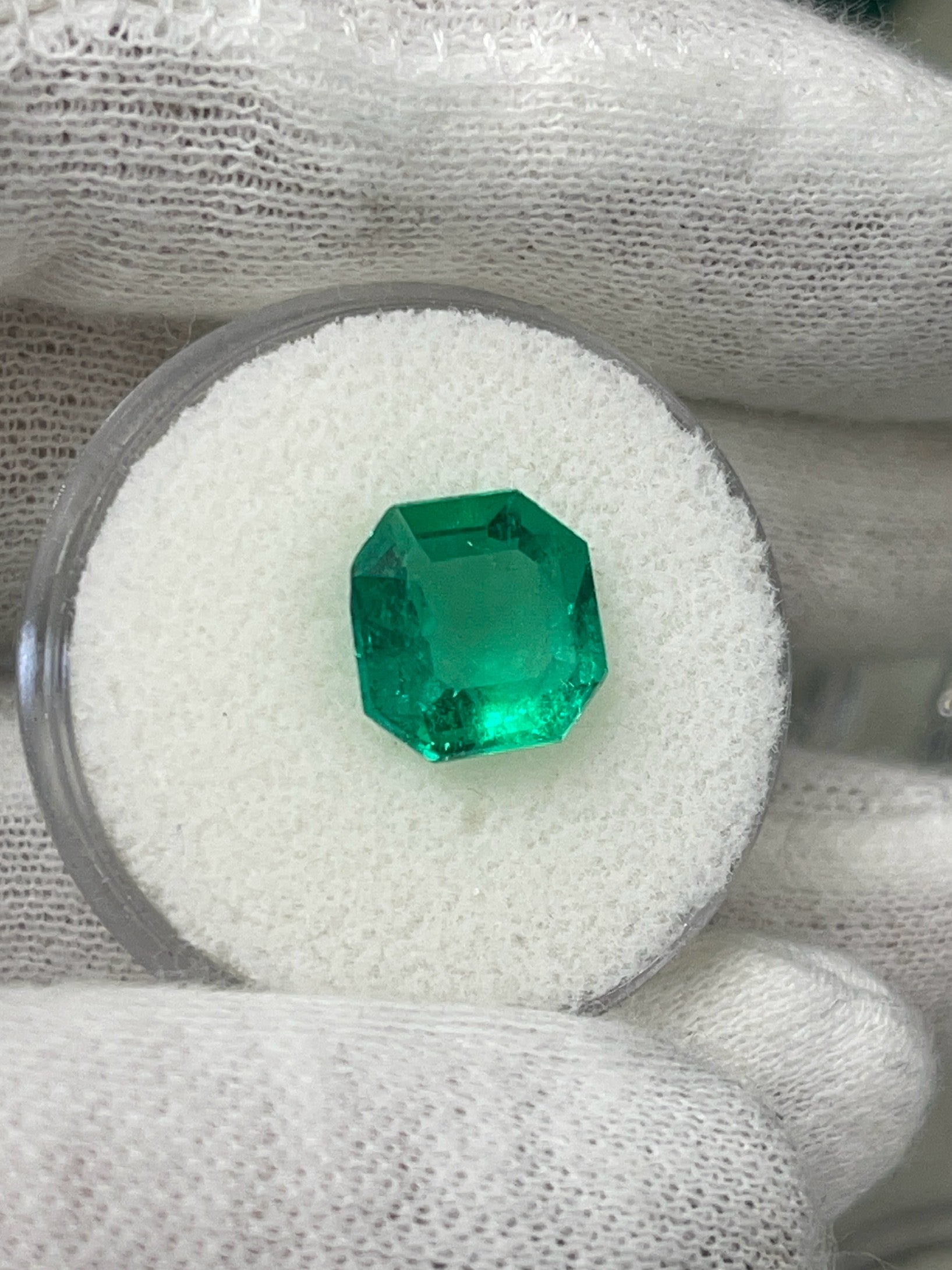 Natural 3.21 carat green Colombian emerald loose gemstone with octagonal cut, showcasing vibrant color and clarity.