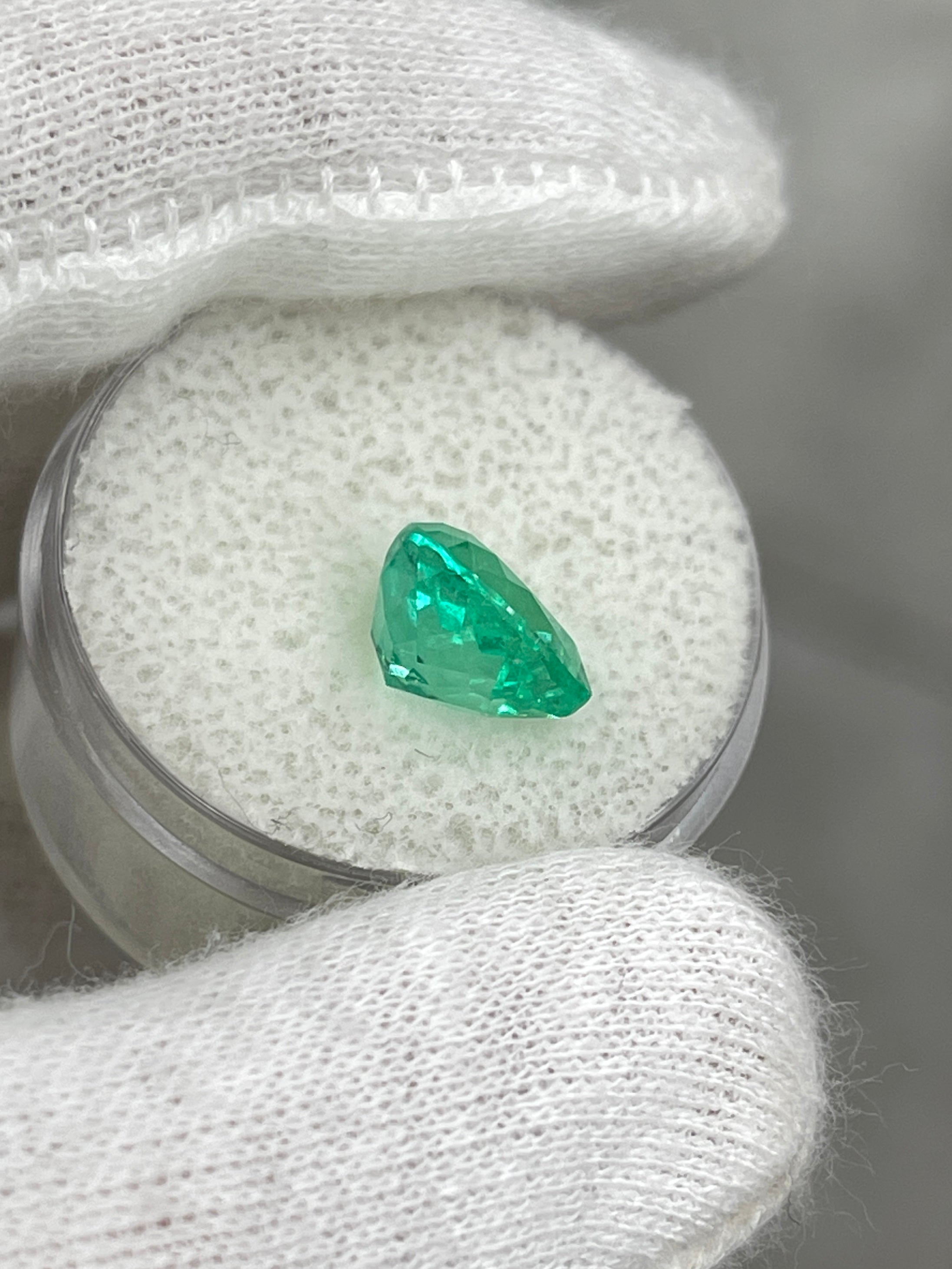 Bright medium green 3.24 carat Colombian emerald in heart cut, showcasing vibrant color and clarity from JR Colombian Emeralds.
