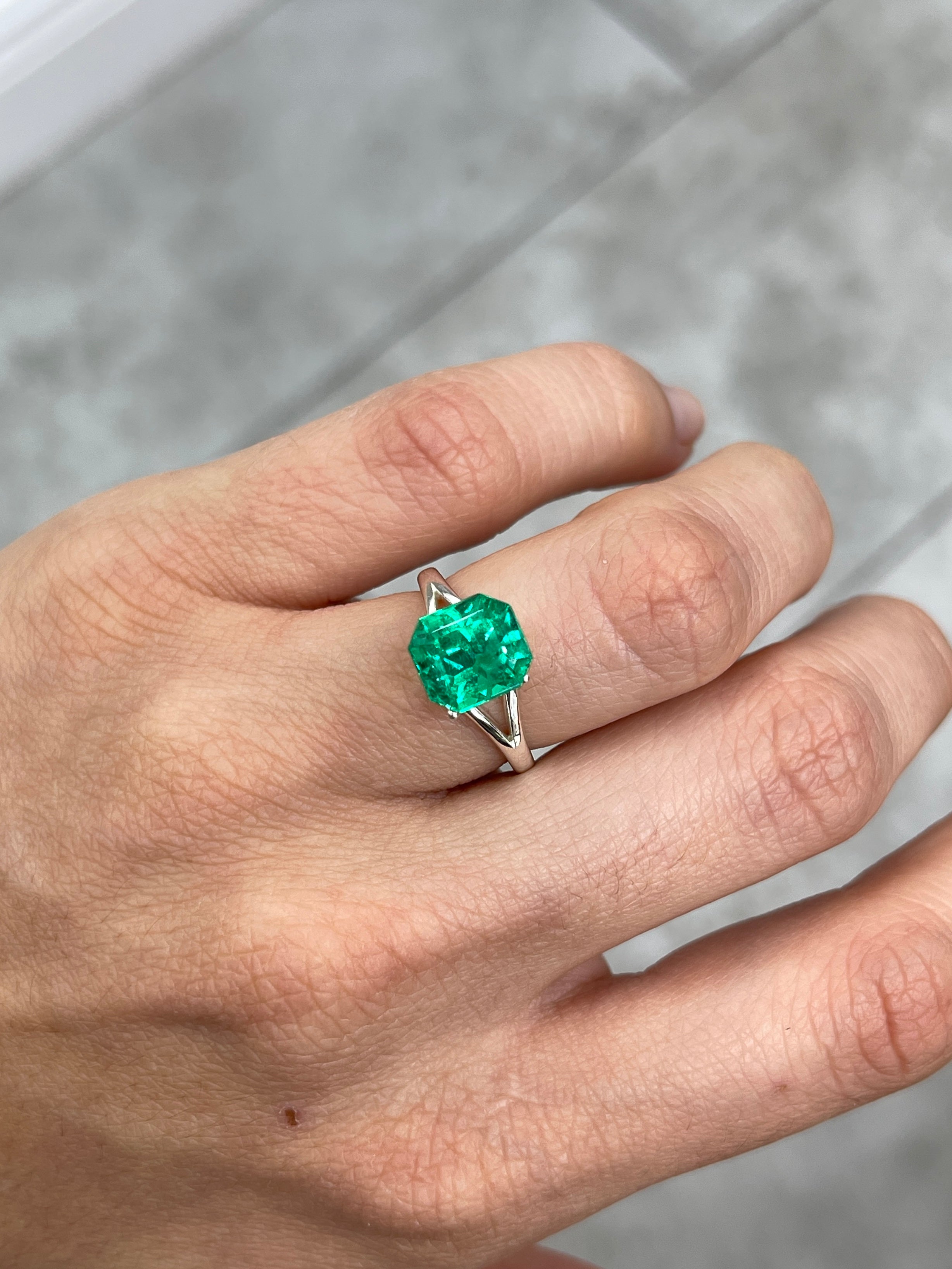 3.26 carat vivid yellowish green Colombian emerald in an emerald cut, showcasing a rich, vibrant gemstone from JR Colombian Emeralds.