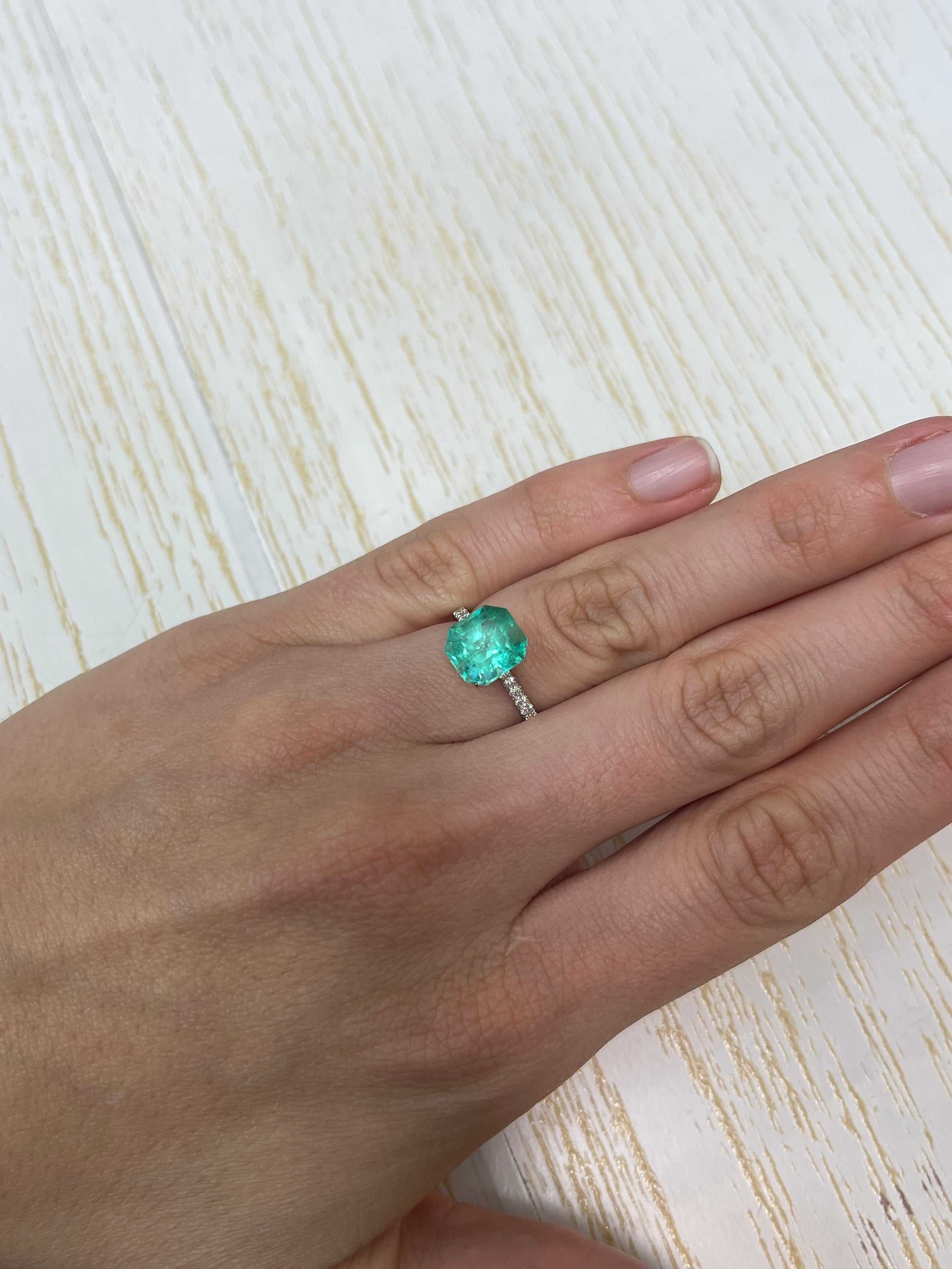 Natural 3.27 carat Colombian emerald loose gemstone with an Asscher cut, showcasing vibrant green color and clarity.