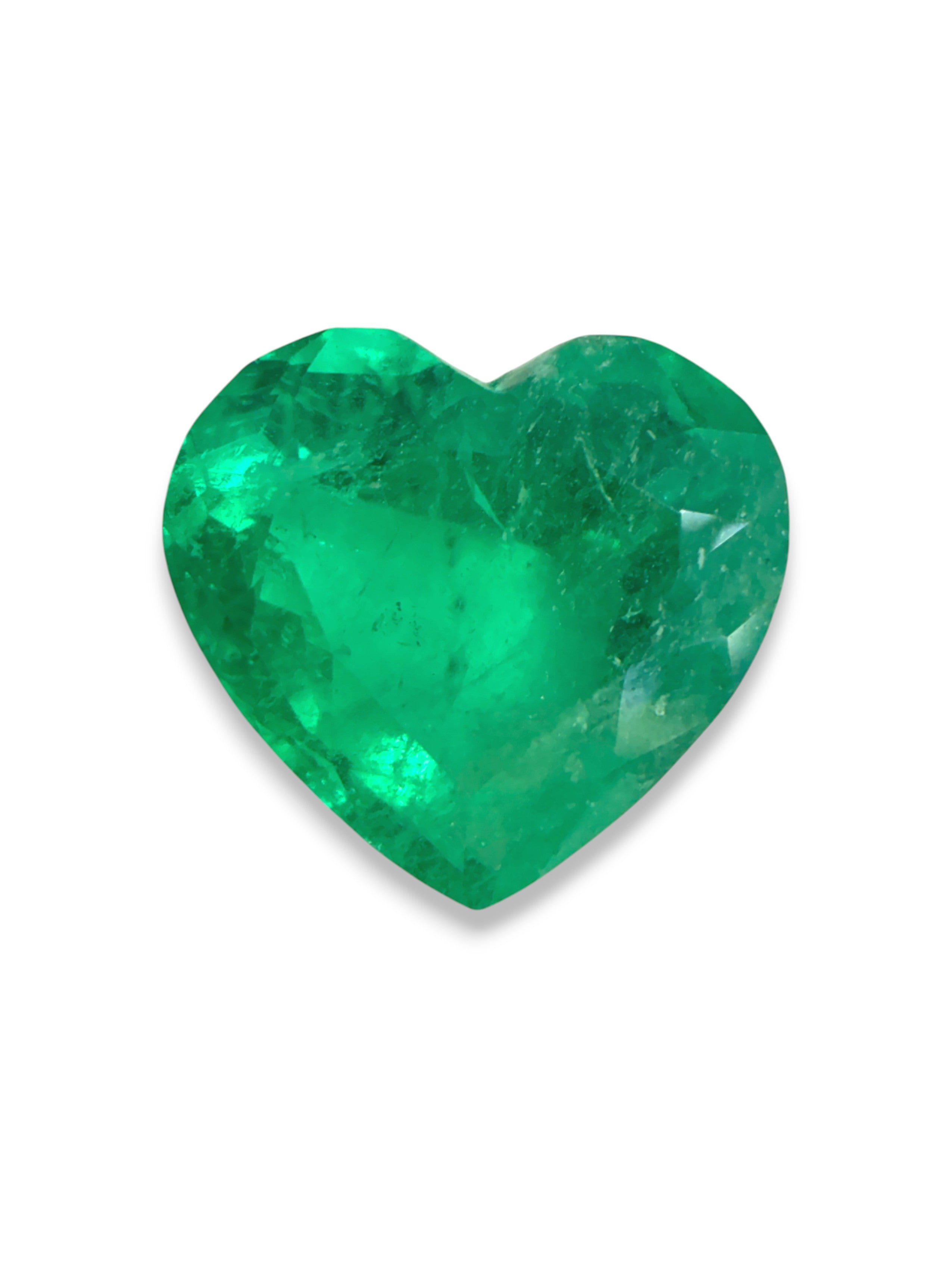 Yellowish-green 3.28 carat Colombian emerald loose heart cut gemstone from JR Colombian Emeralds, vibrant and natural.