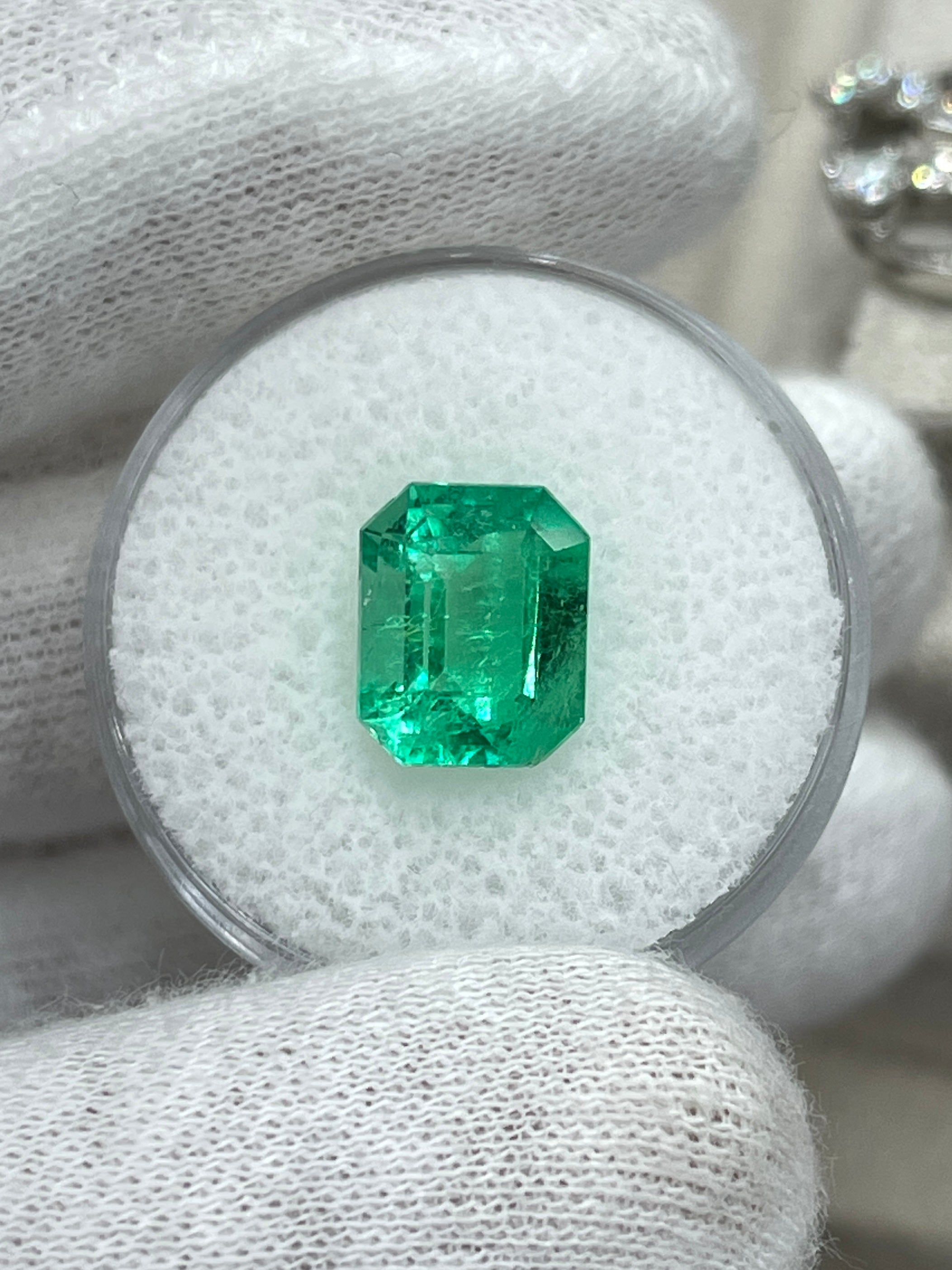 Glowing 3.30 carat natural Colombian emerald loose gemstone with emerald cut, vibrant green color from JR Colombian Emeralds.