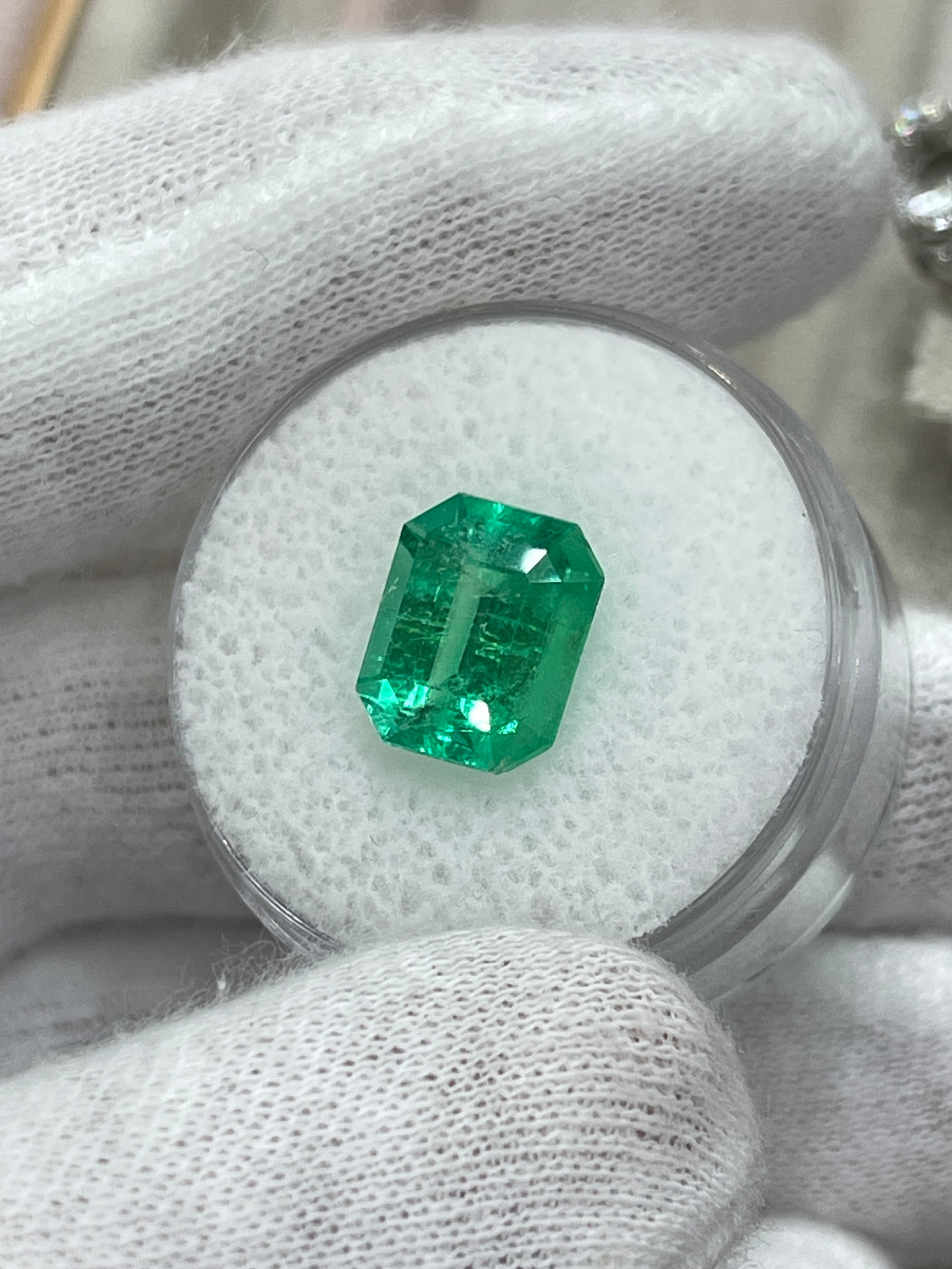 Natural 3.30 carat glowing green Colombian emerald loose gemstone in emerald cut, from JR Colombian Emeralds.