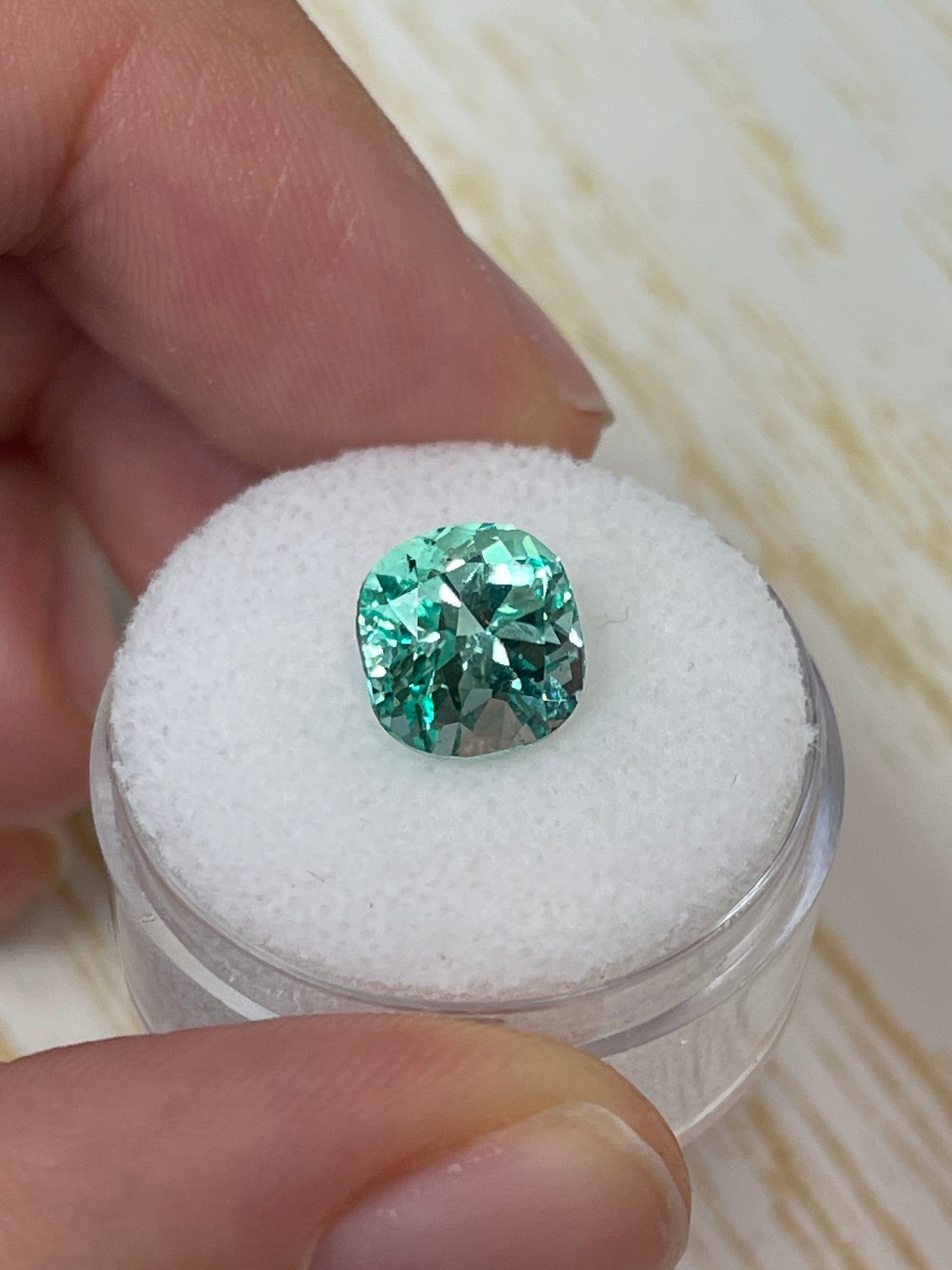 3.31 carat natural Colombian emerald loose gemstone, 9x9mm cushion cut, pastel light green, from JR Colombian Emeralds.