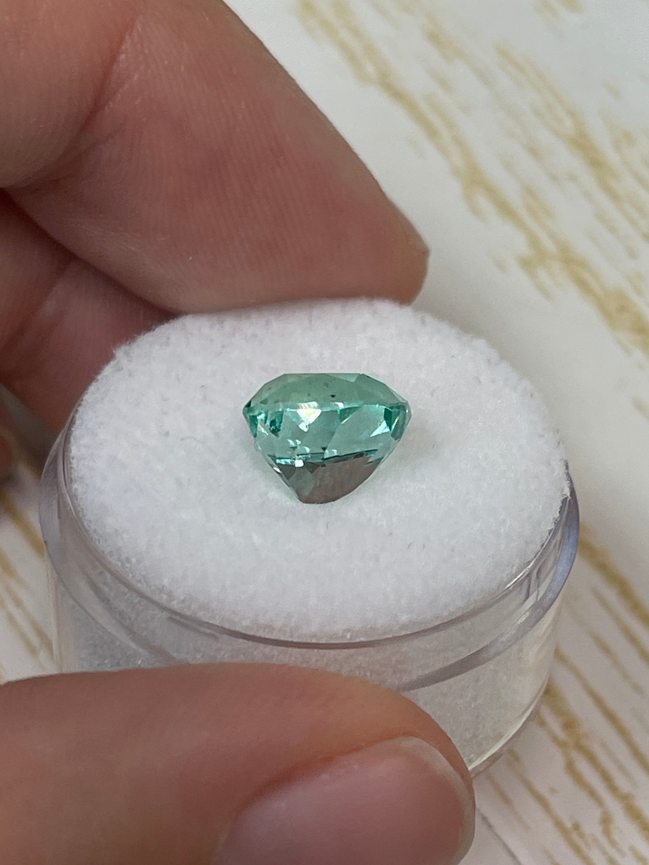 3.31 carat natural Colombian emerald loose cushion cut with pastel light green color, from JR Colombian Emeralds.