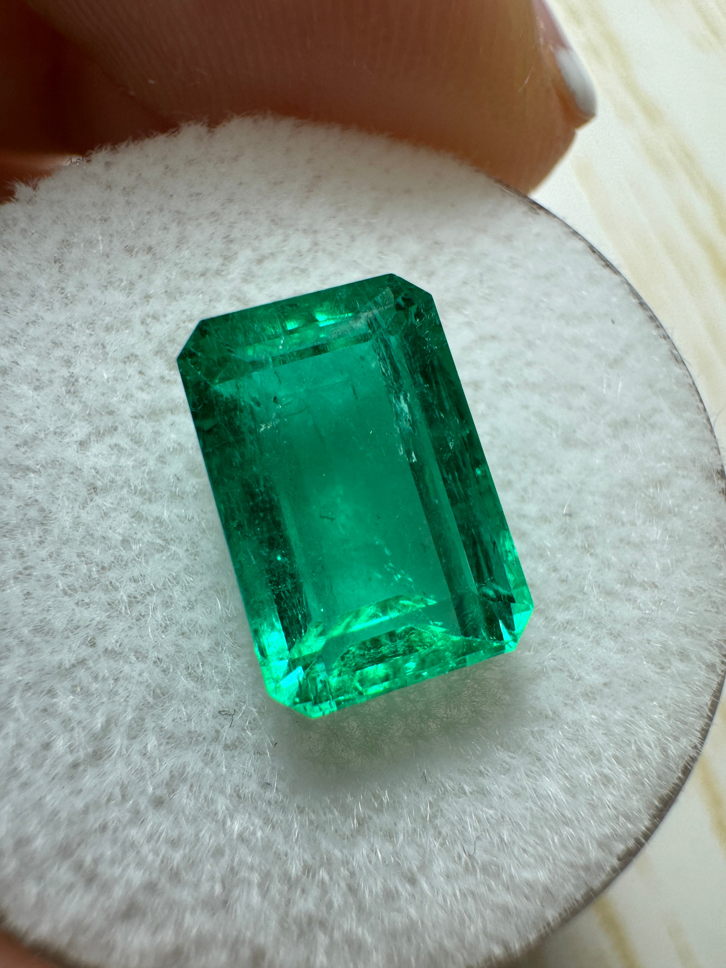 3.40 carat GIA-certified vivid bluish-green Colombian emerald in elongated cut, natural loose gemstone with vibrant color and clarity.
