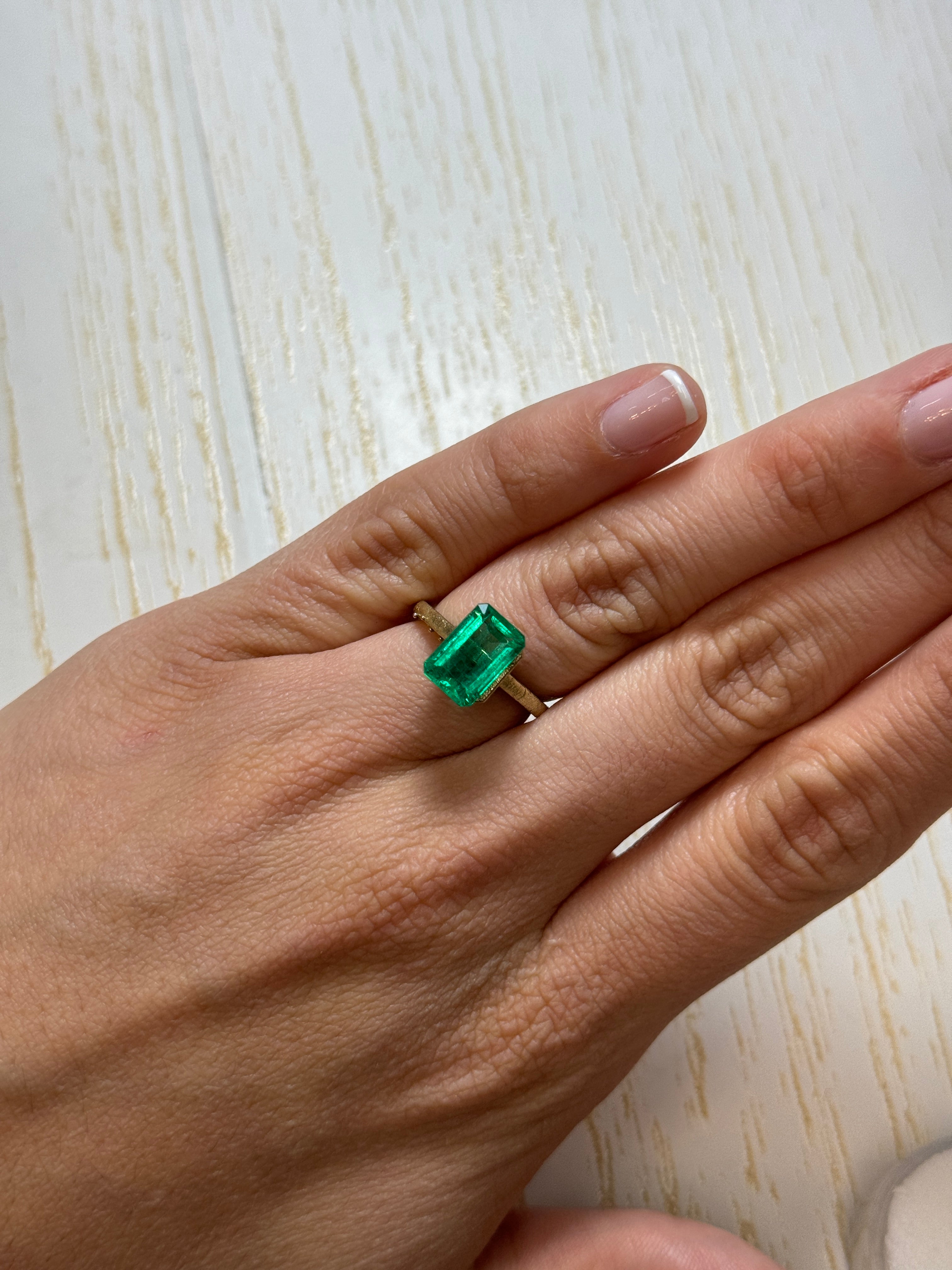 Vivid bluish green 3.40 carat GIA certified Colombian emerald in elongated cut, natural loose gemstone from JR Colombian Emeralds.