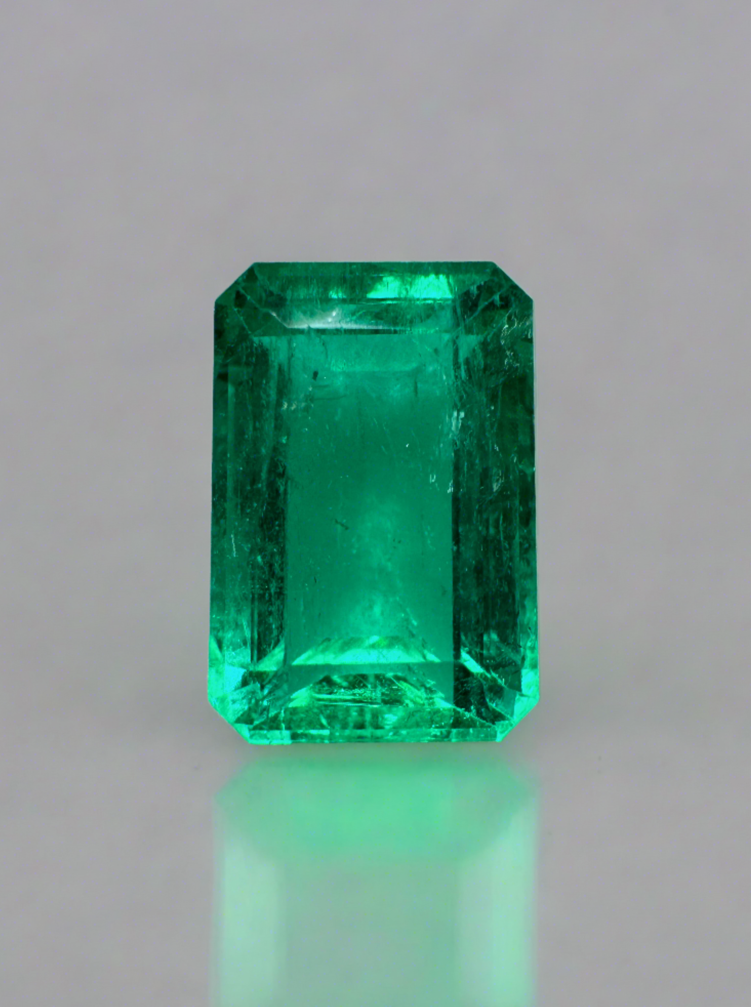 Vivid bluish green 3.40 carat GIA certified Colombian emerald in elongated cut, natural loose gemstone from JR Colombian Emeralds