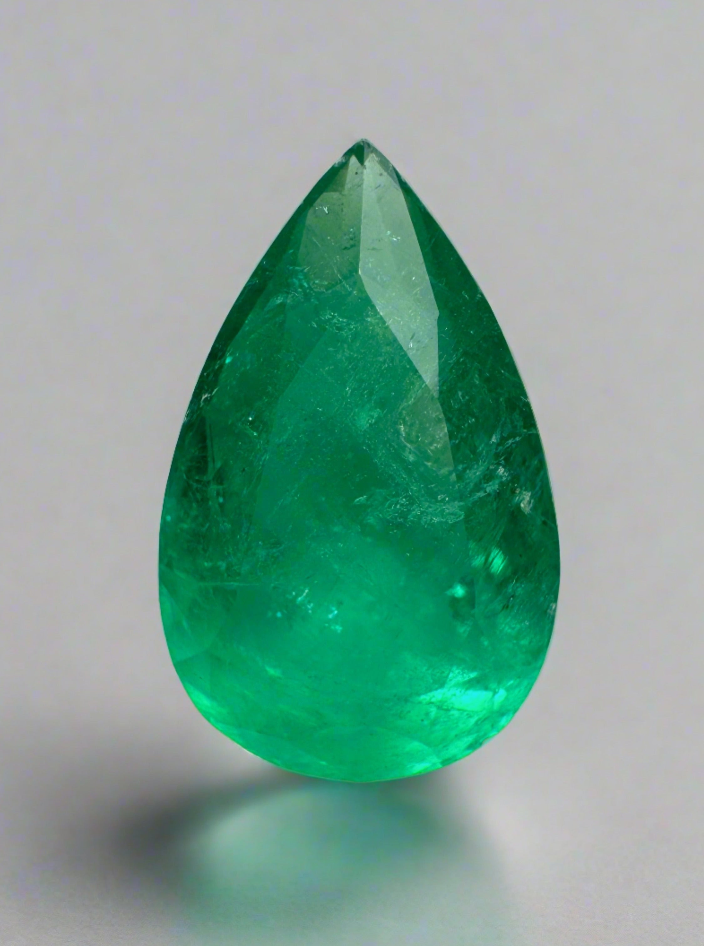 Natural 3.46 carat grass green Colombian emerald in pear cut, loose gemstone from JR Colombian Emeralds.