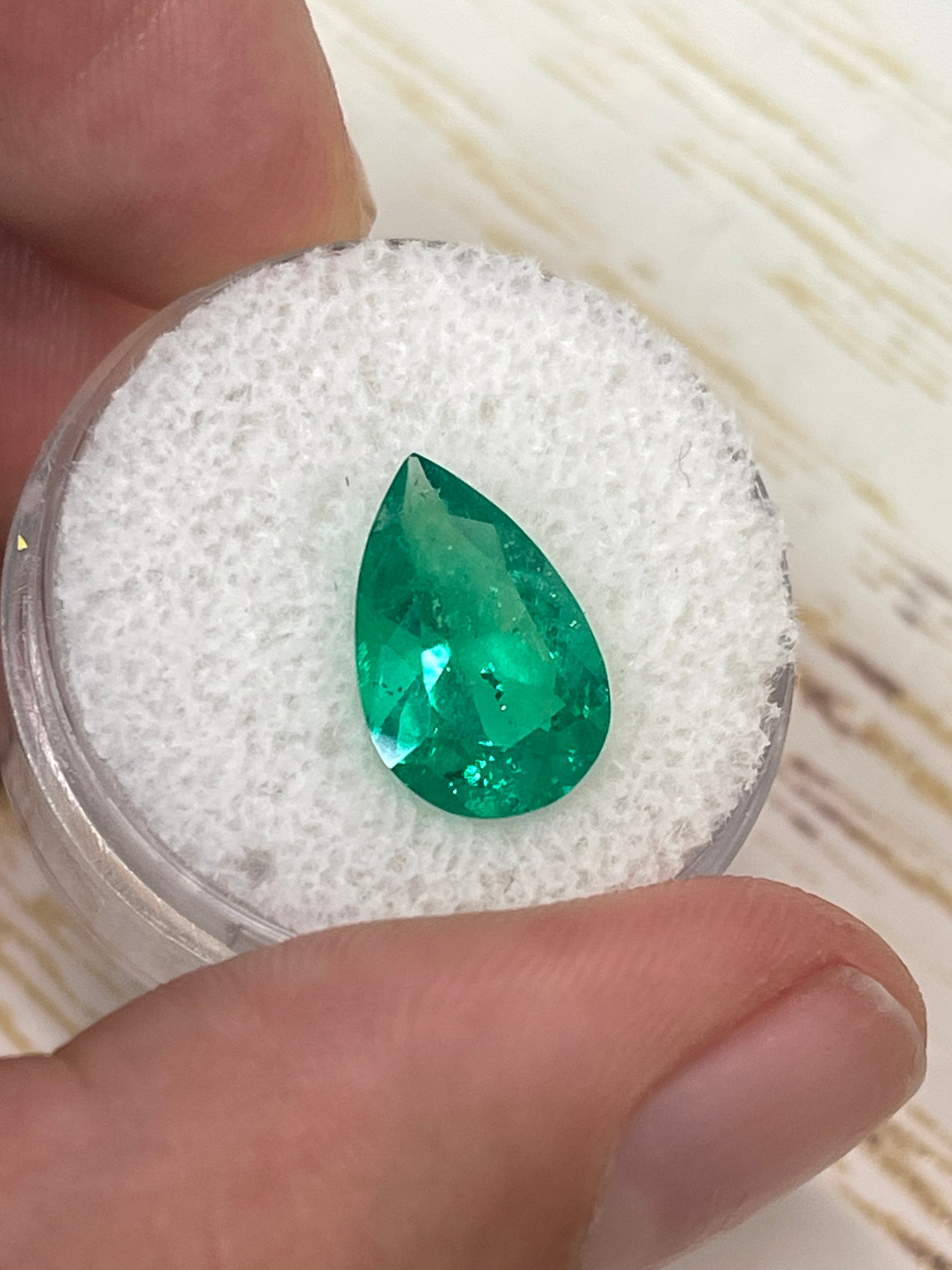 Fine 3.47 carat natural Colombian emerald in pear cut, loose gemstone with vibrant green color from JR Colombian Emeralds.