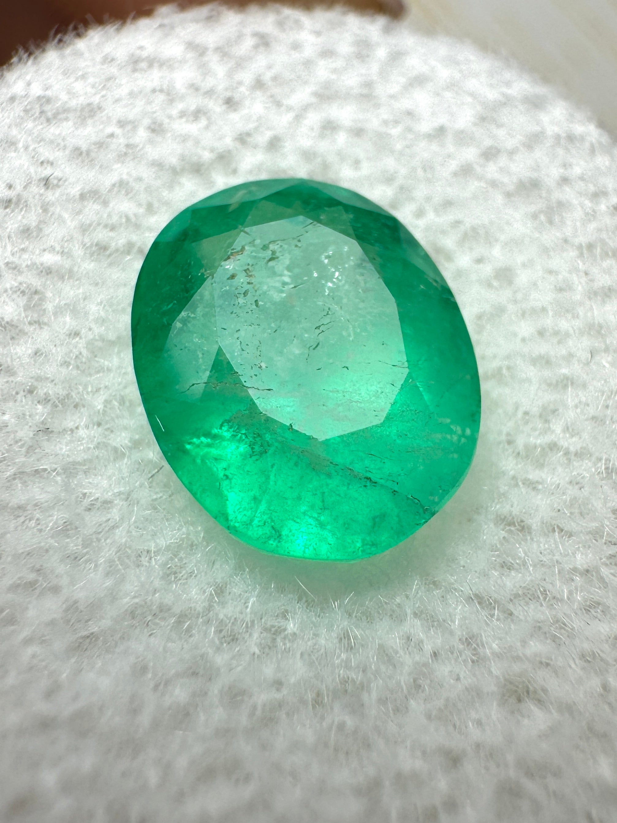 3.48-carat semi-transparent green Colombian emerald loose oval cut gemstone from JR Colombian Emeralds, showcasing vibrant natural color.
