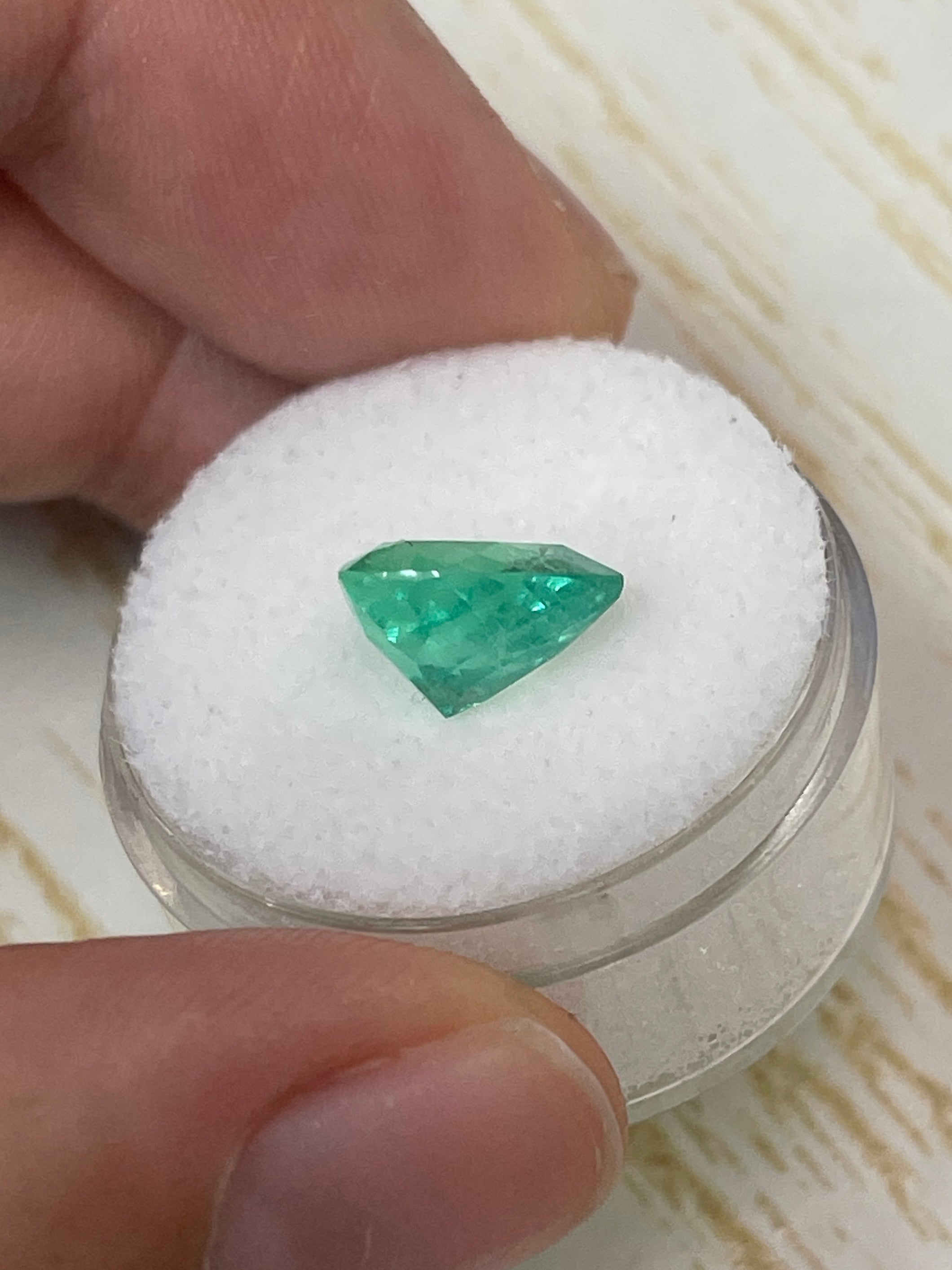 3.50 carat bubbly green Colombian emerald loose gemstone in heart cut, showcasing vibrant natural color and clarity.
