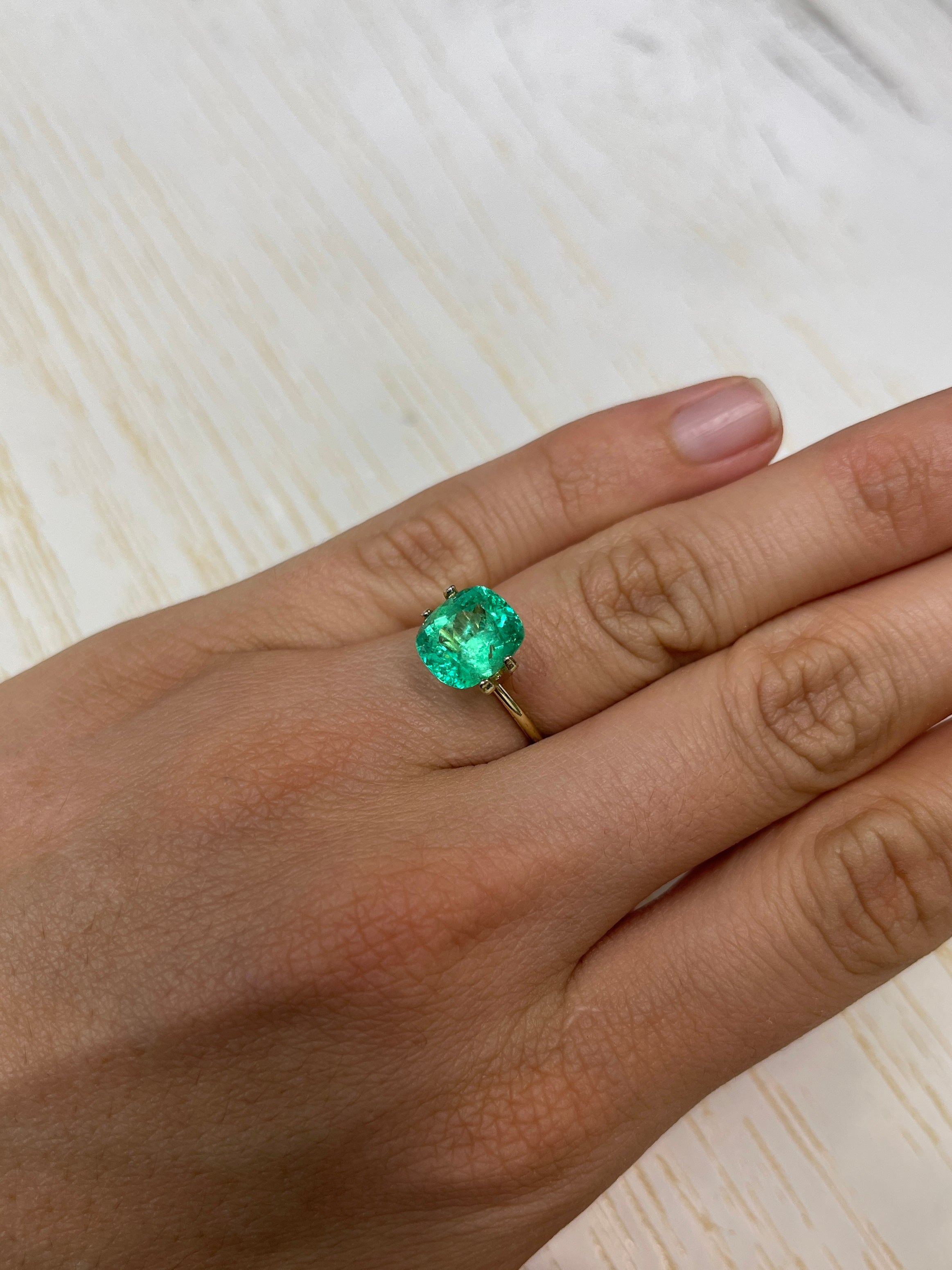 3.50 carat yellowish green Colombian emerald loose cushion cut gemstone by JR Colombian Emeralds, natural and faceted.