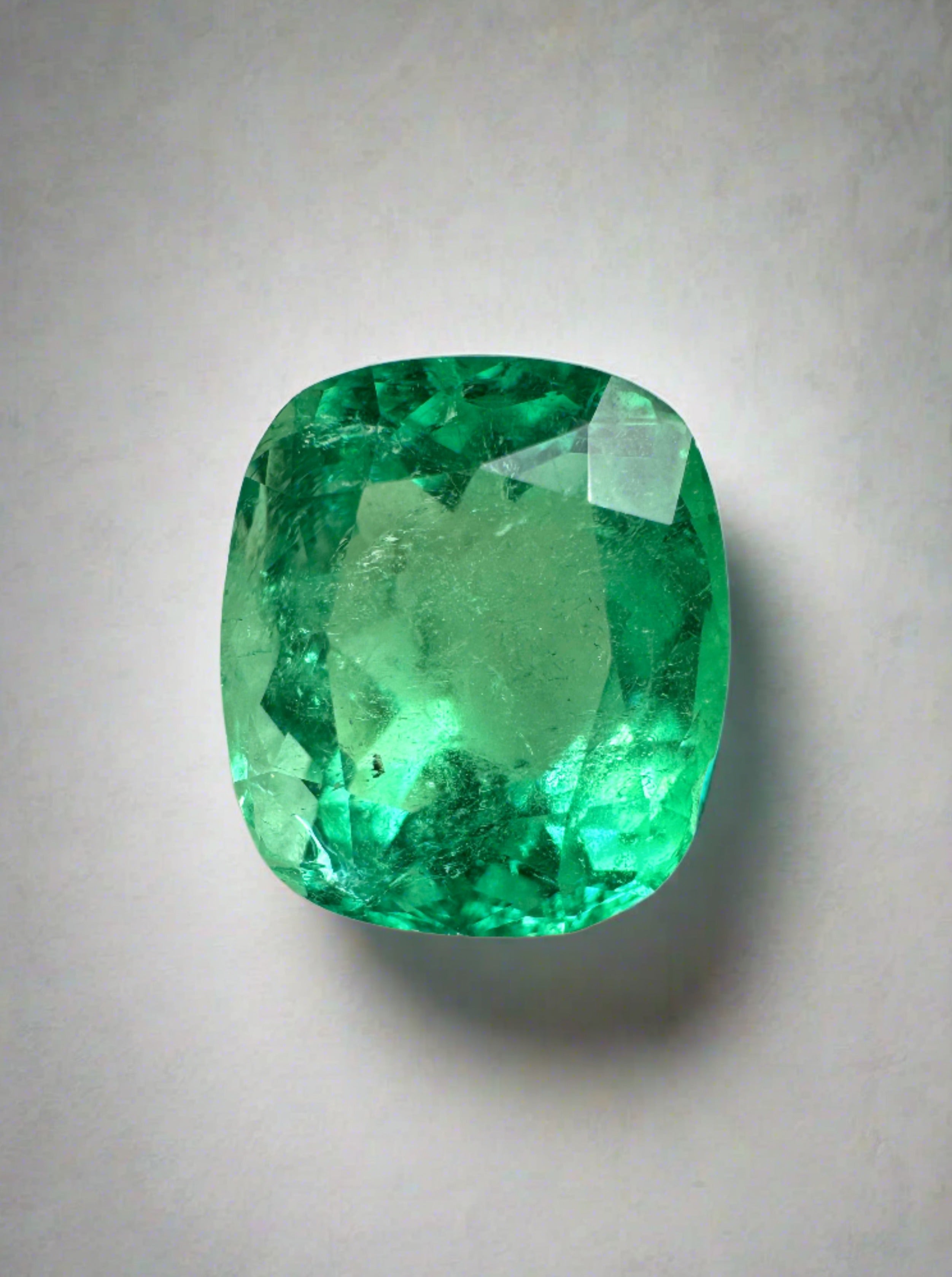 Natural 3.50 carat yellowish green Colombian emerald in cushion cut, loose gemstone with vibrant color and clarity.