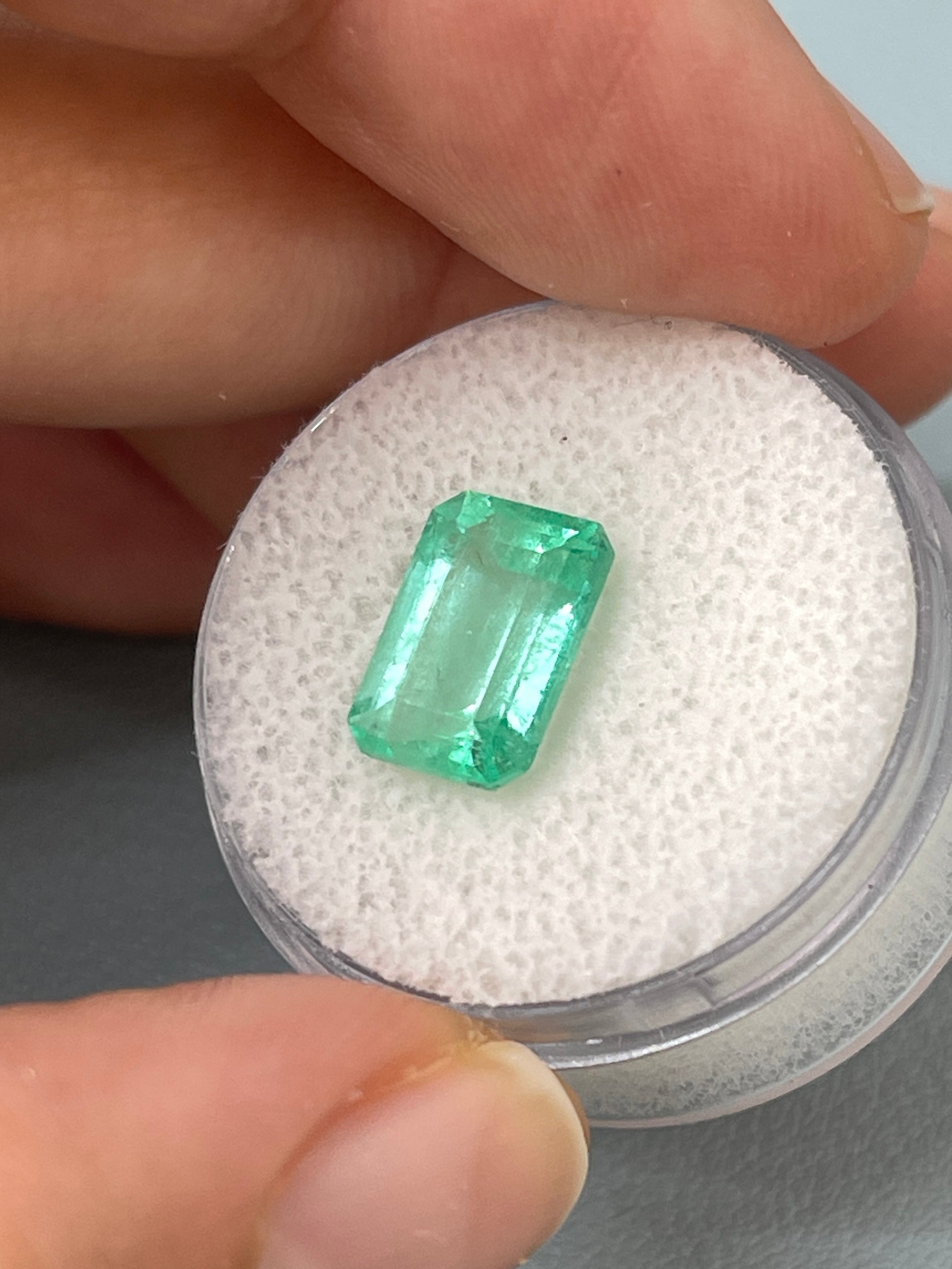 Seafoam green 3.54 carat natural Colombian emerald loose gemstone in an emerald cut by JR Colombian Emeralds