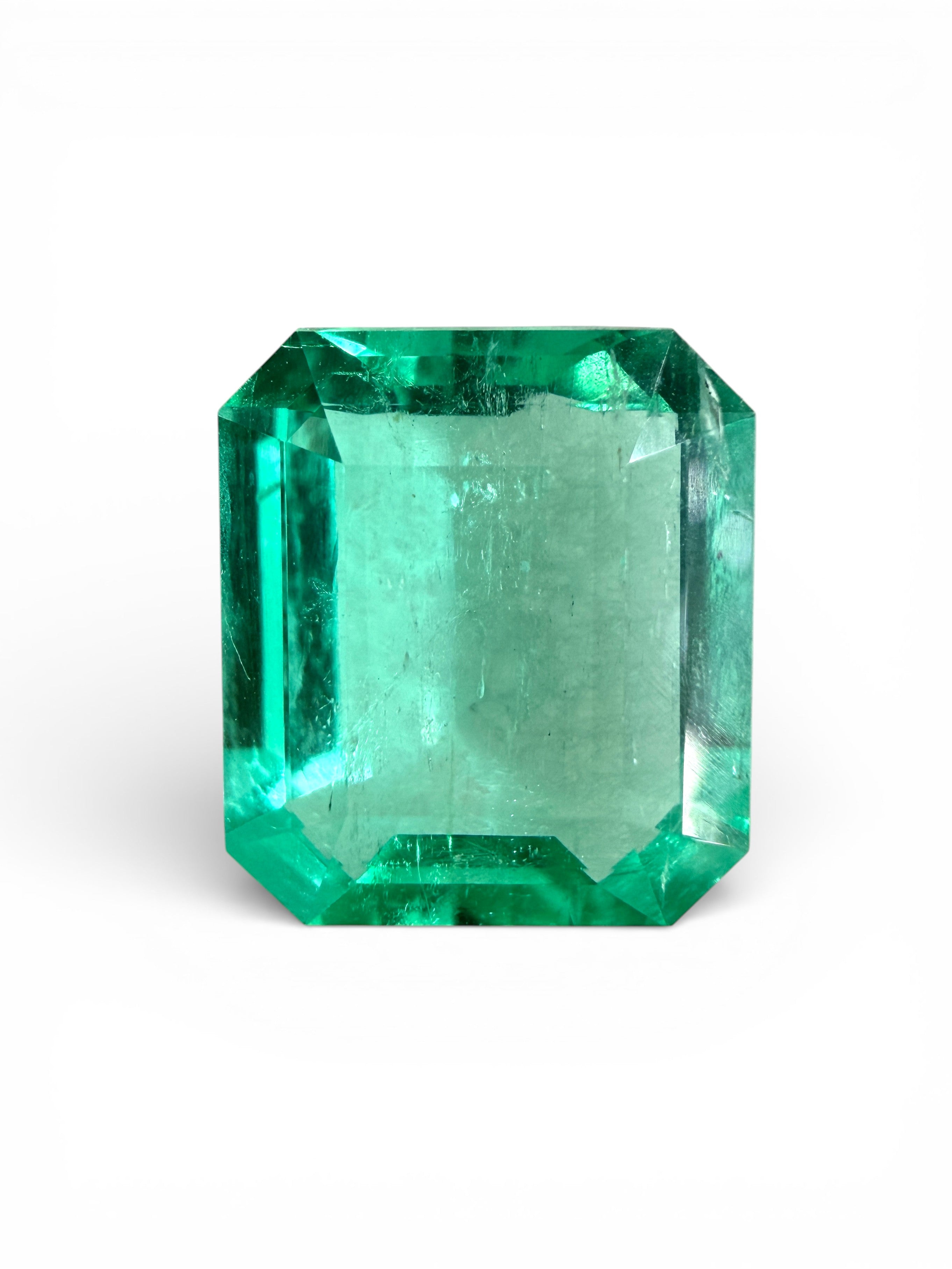 3.54 carat natural Colombian emerald loose gemstone with a portrait cut, showcasing vibrant green color and crystal clarity.