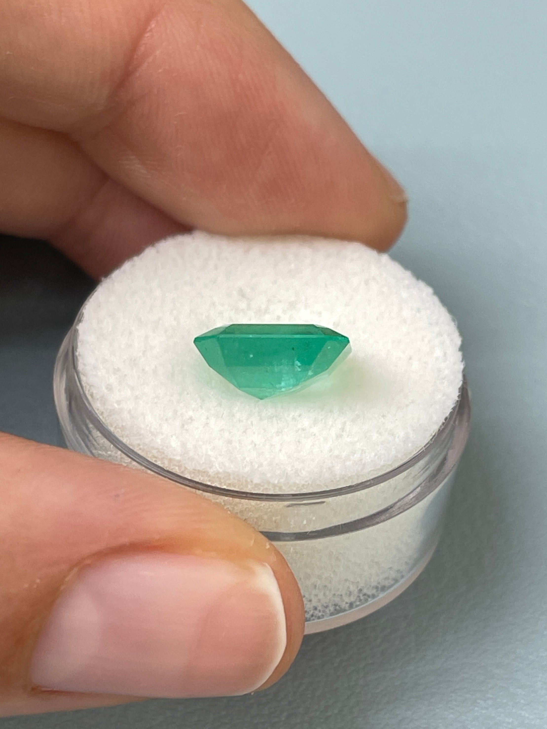 Spring green 3.59 carat Colombian emerald in an Asscher cut, loose gemstone from JR Colombian Emeralds, showcasing vibrant color and clarity.