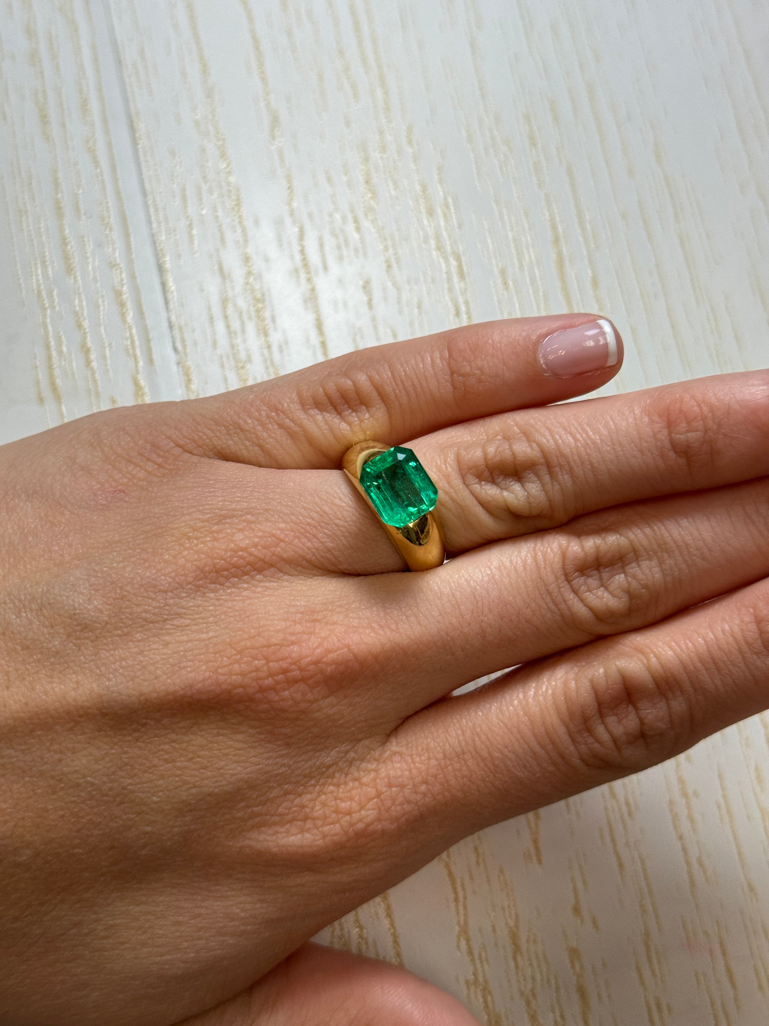3.61 carat vivacious green natural Colombian emerald in emerald cut, loose gemstone from JR Colombian Emeralds.