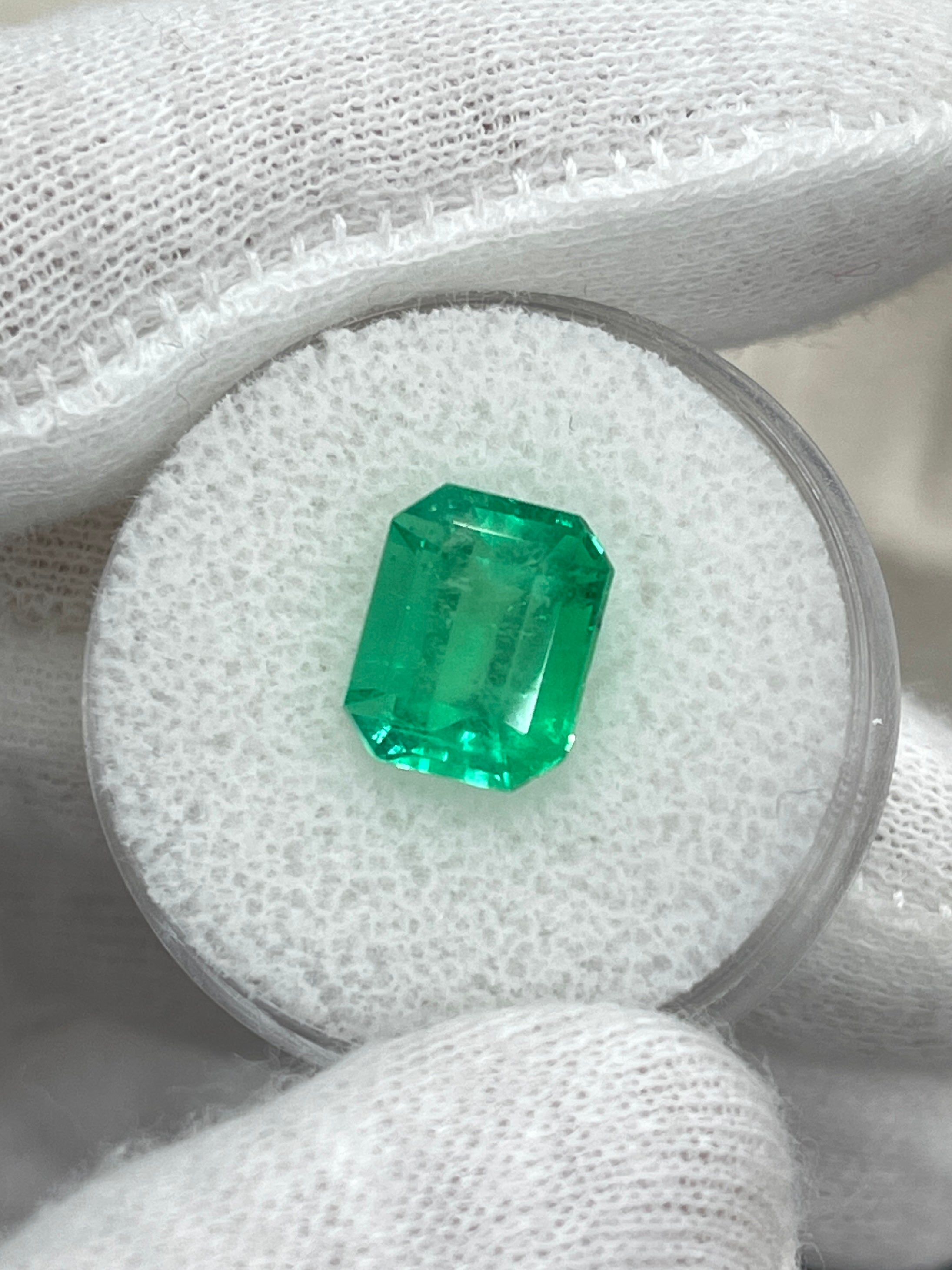 Loose 3.64 carat yellowish-green Colombian emerald cut by JR Colombian Emeralds, showcasing a vibrant natural gemstone.