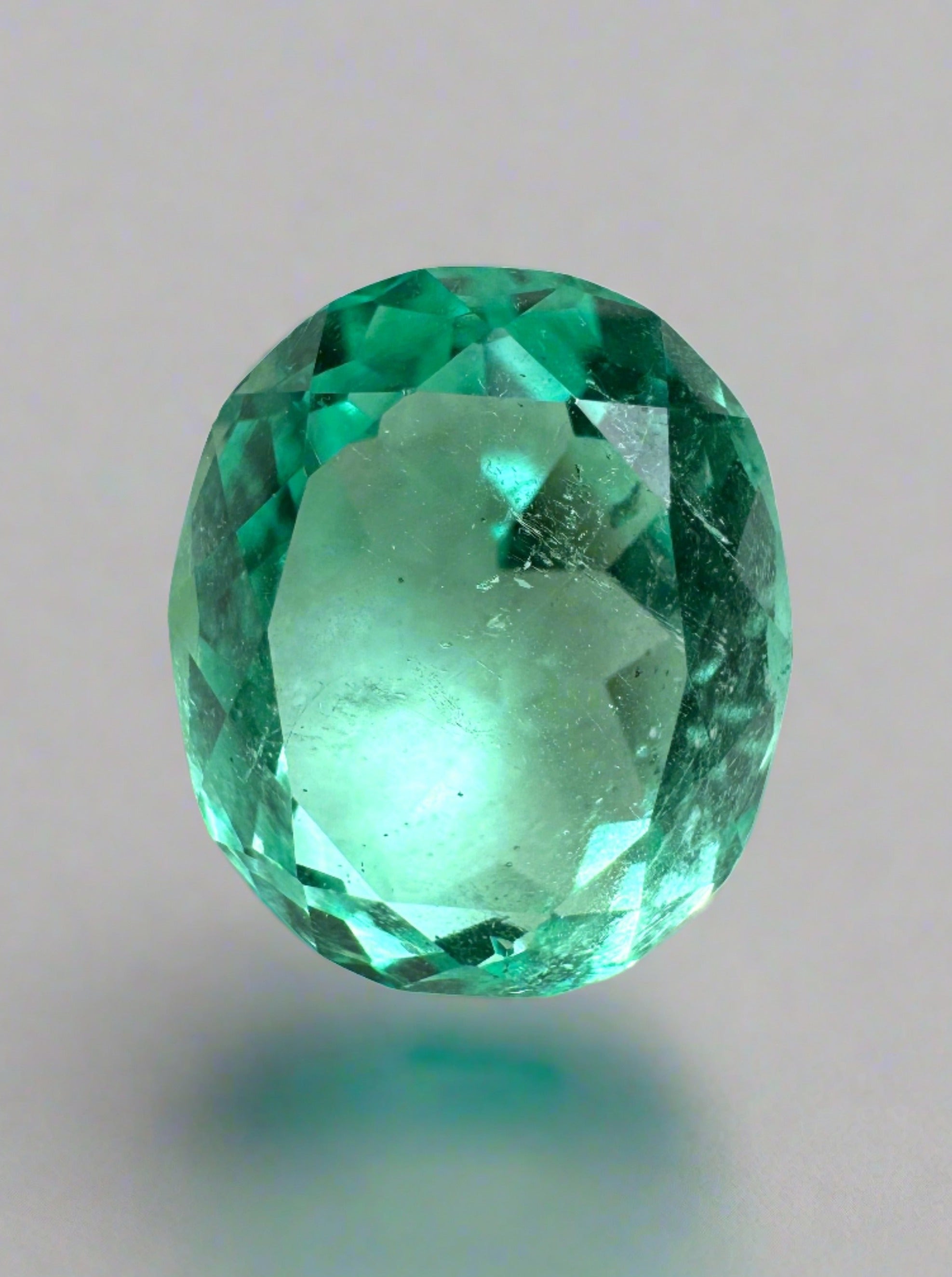 3.70 carat oval cut Colombian emerald with VS clarity, vibrant green, loose gemstone from JR Colombian Emeralds