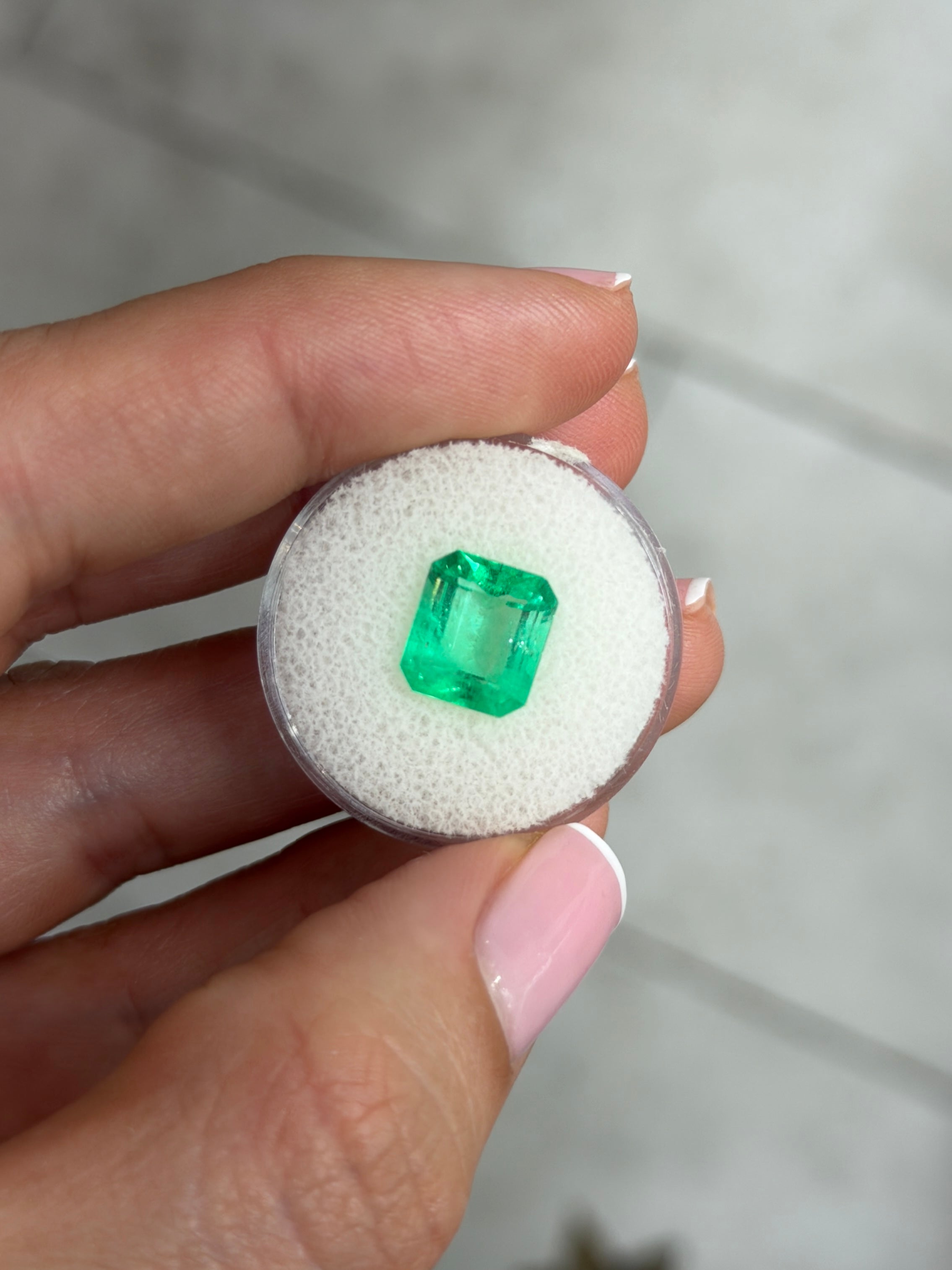 3.72 carat natural Colombian emerald loose gemstone, emerald cut, vibrant spring green color, from JR Colombian Emeralds.