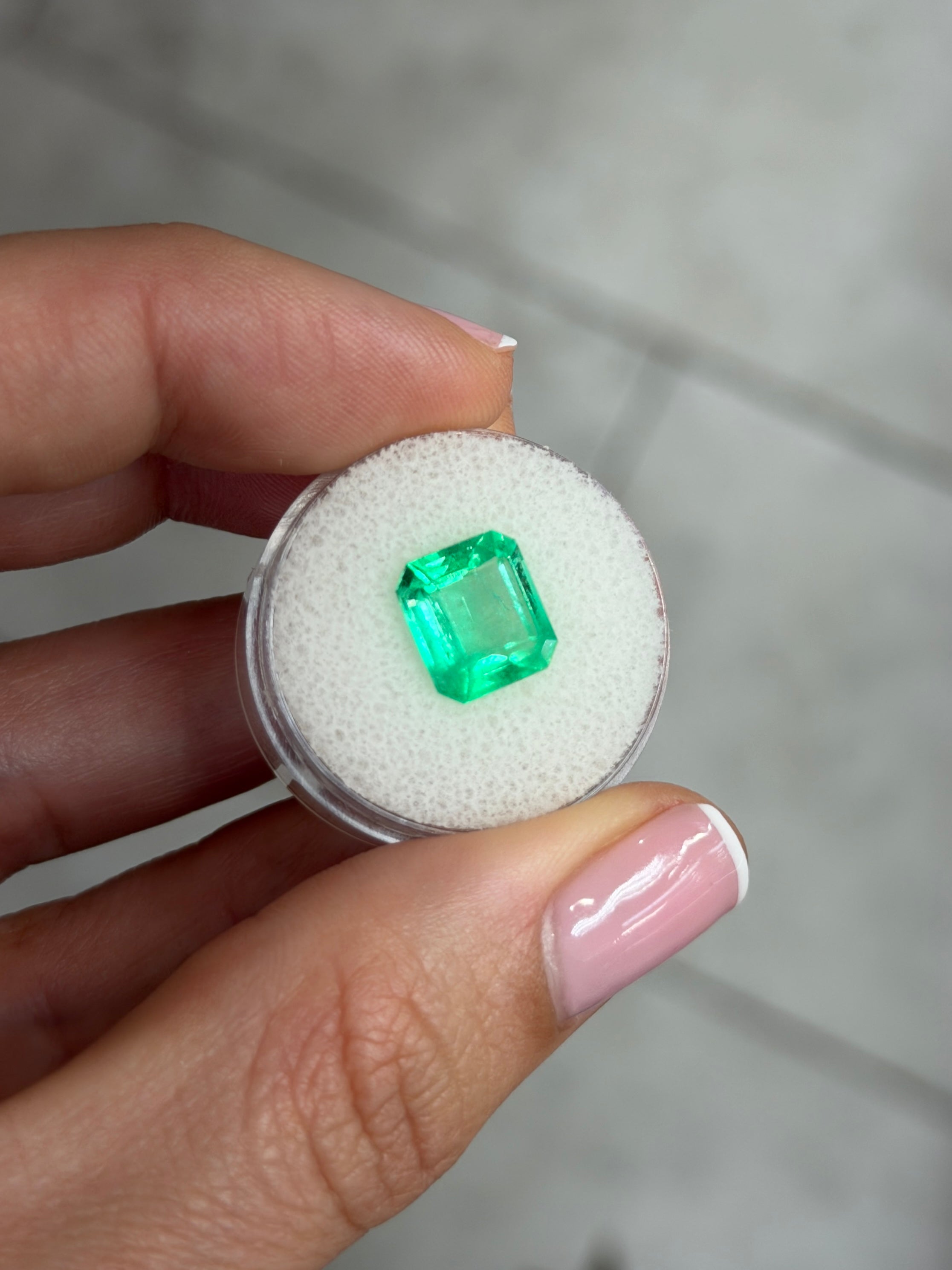 Natural 3.72 carat spring green Colombian emerald in 10x9 emerald cut, loose gemstone from JR Colombian Emeralds.