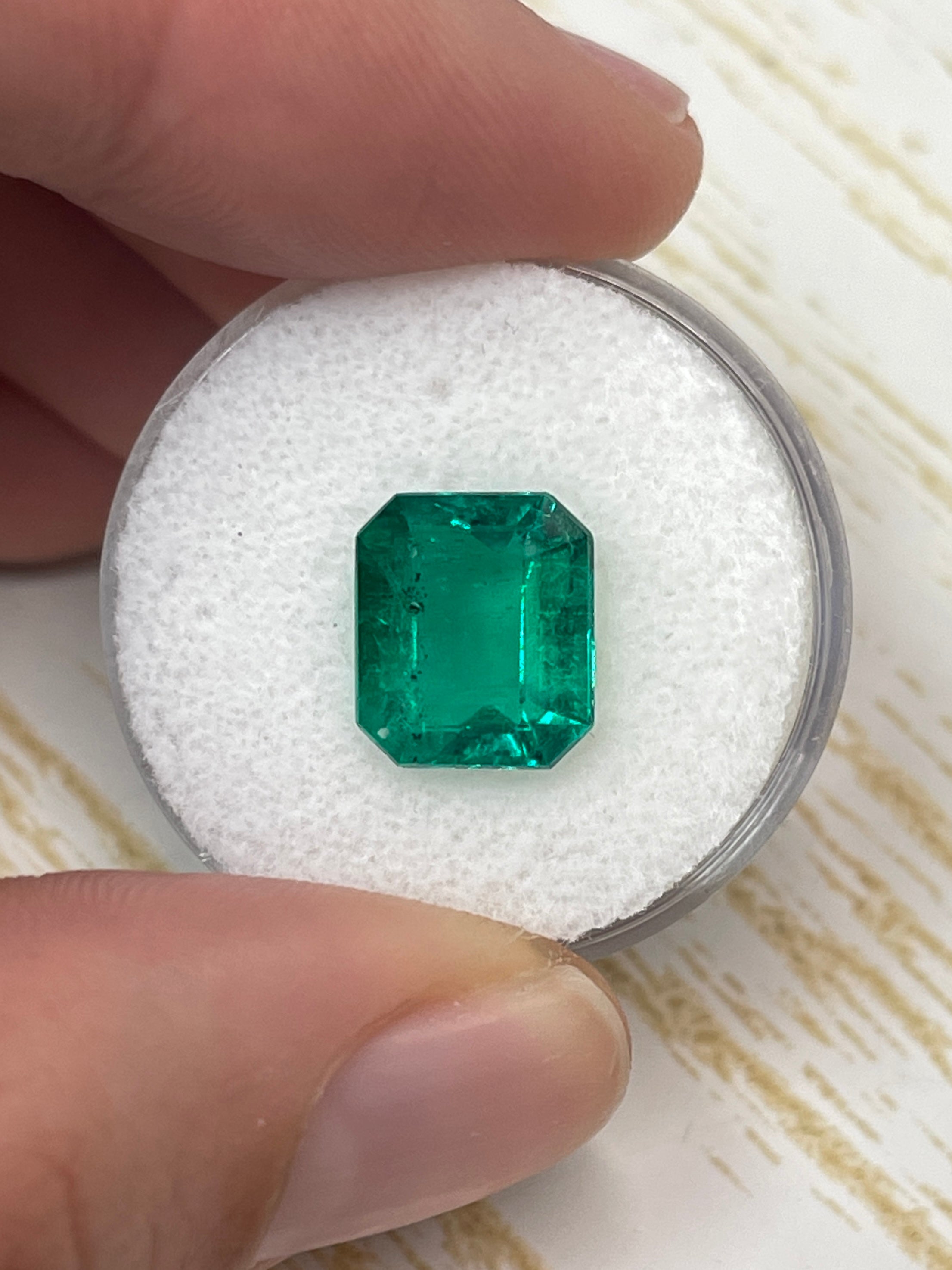 AAA+ 3.72 carat natural Colombian emerald loose gemstone, 11x9mm emerald cut with green color and natural freckles.