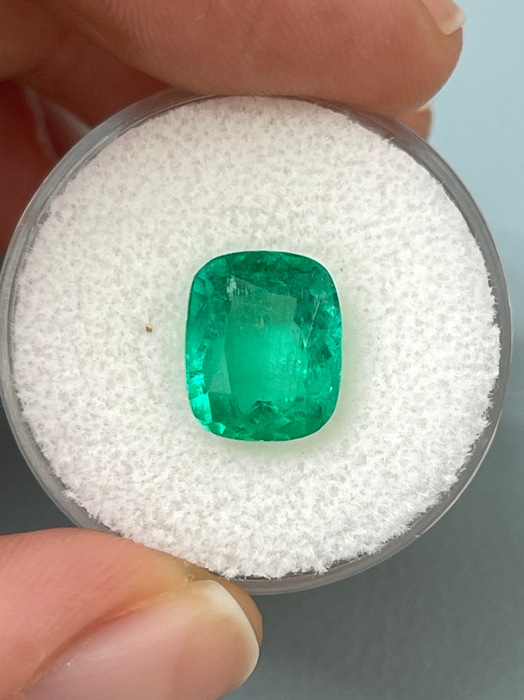 3.85 carat medium green Colombian emerald loose cushion cut gemstone, bright natural green color, from JR Colombian Emeralds.