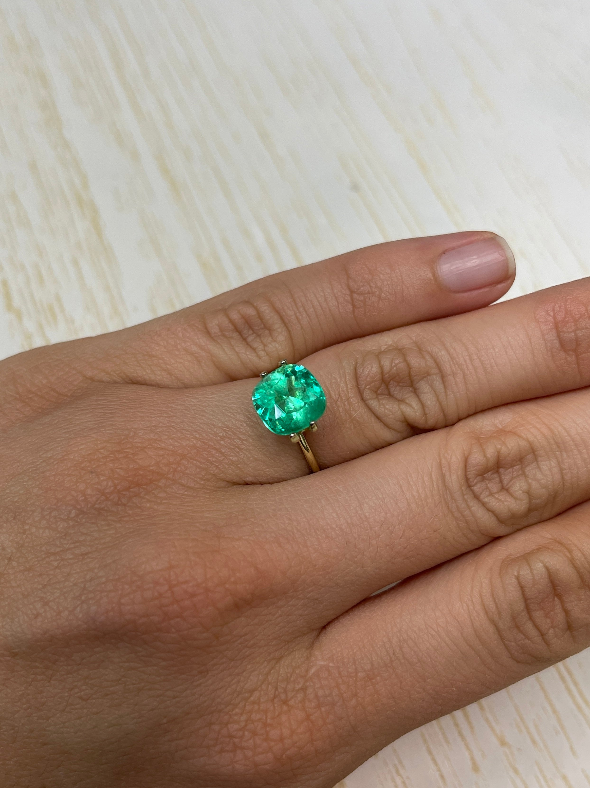 Bright yellowish green 3.85 carat natural Colombian emerald in cushion cut, loose gemstone from JR Colombian Emeralds.