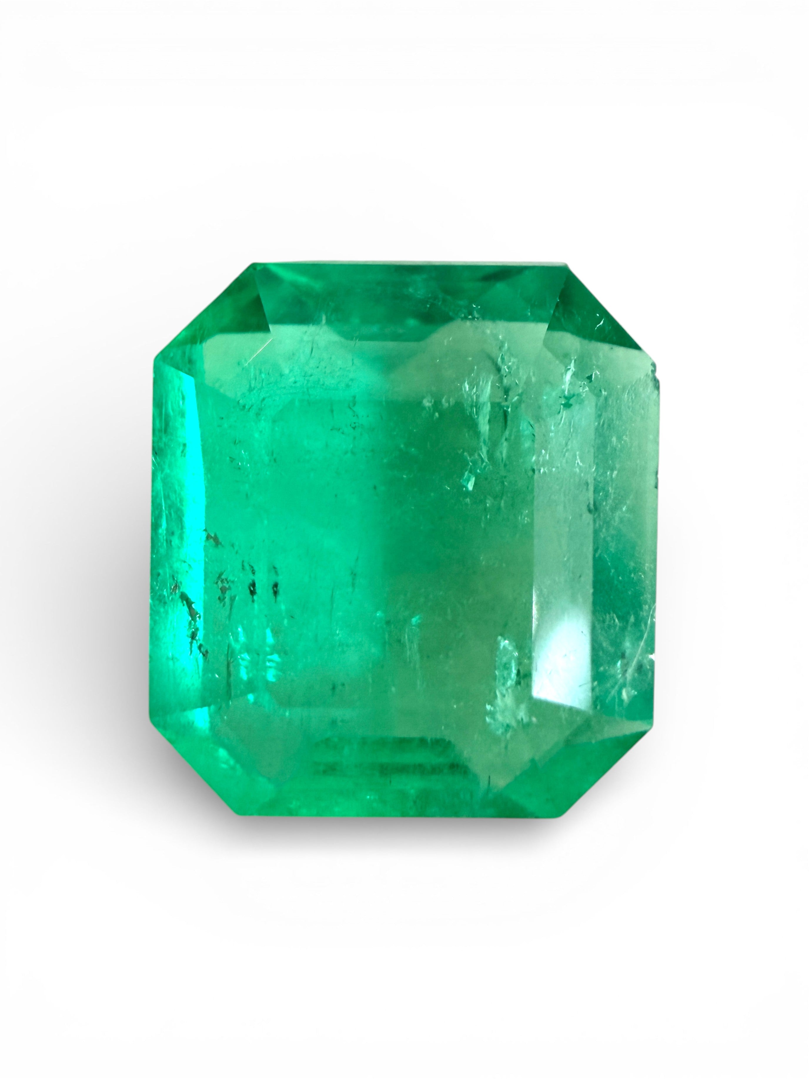 3.94 Carat yellowish green natural Colombian emerald loose gemstone in Asscher cut, from JR Colombian Emeralds.