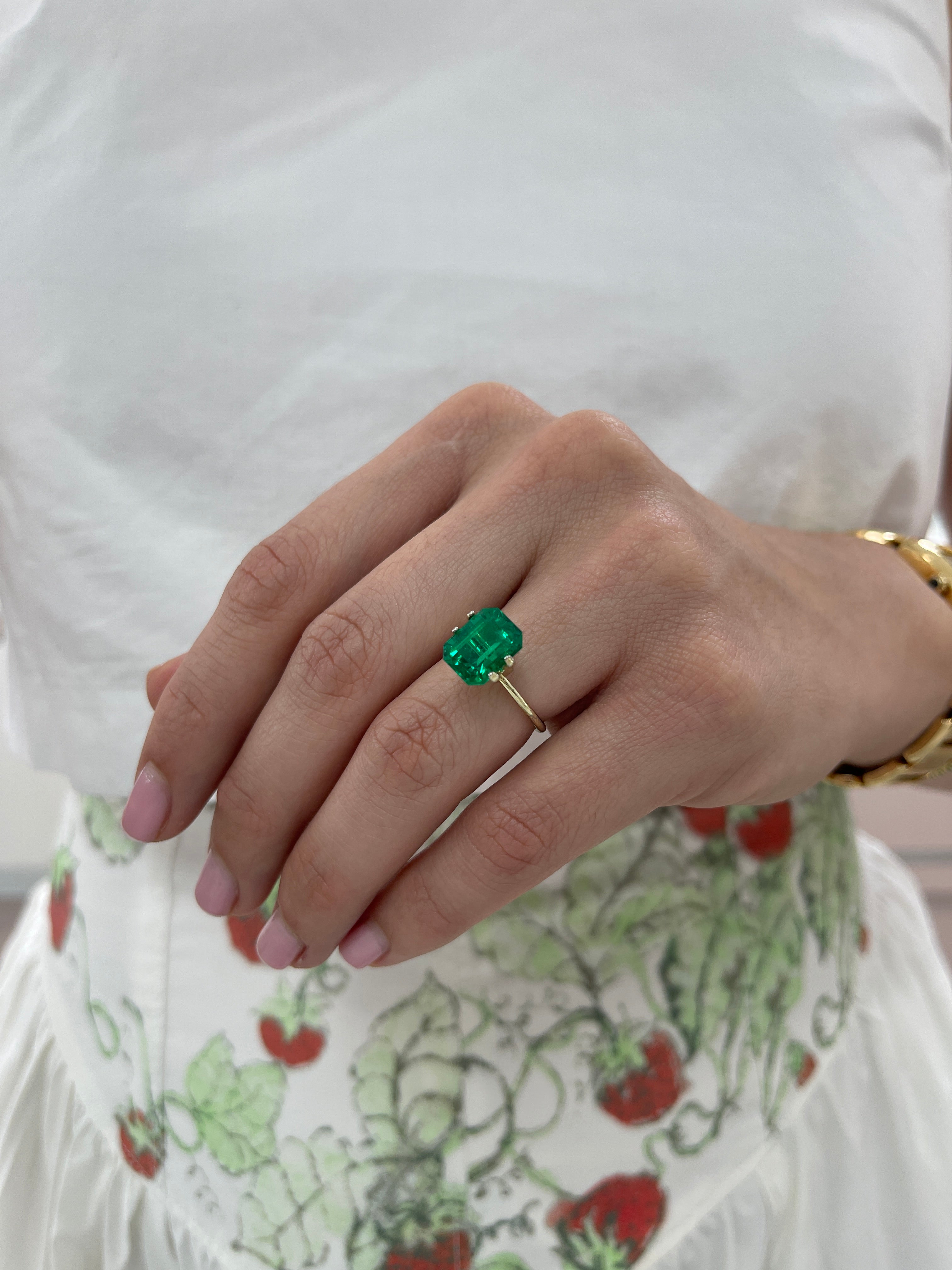 Vivid 4.03 carat AAA minor oil Colombian emerald loose gemstone in emerald cut, from JR Colombian Emeralds.
