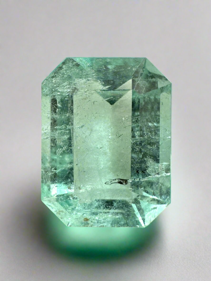 4.06 carat light green Colombian emerald loose gemstone, 11x9 mm, natural with freckles, emerald cut, from JR Colombian Emeralds