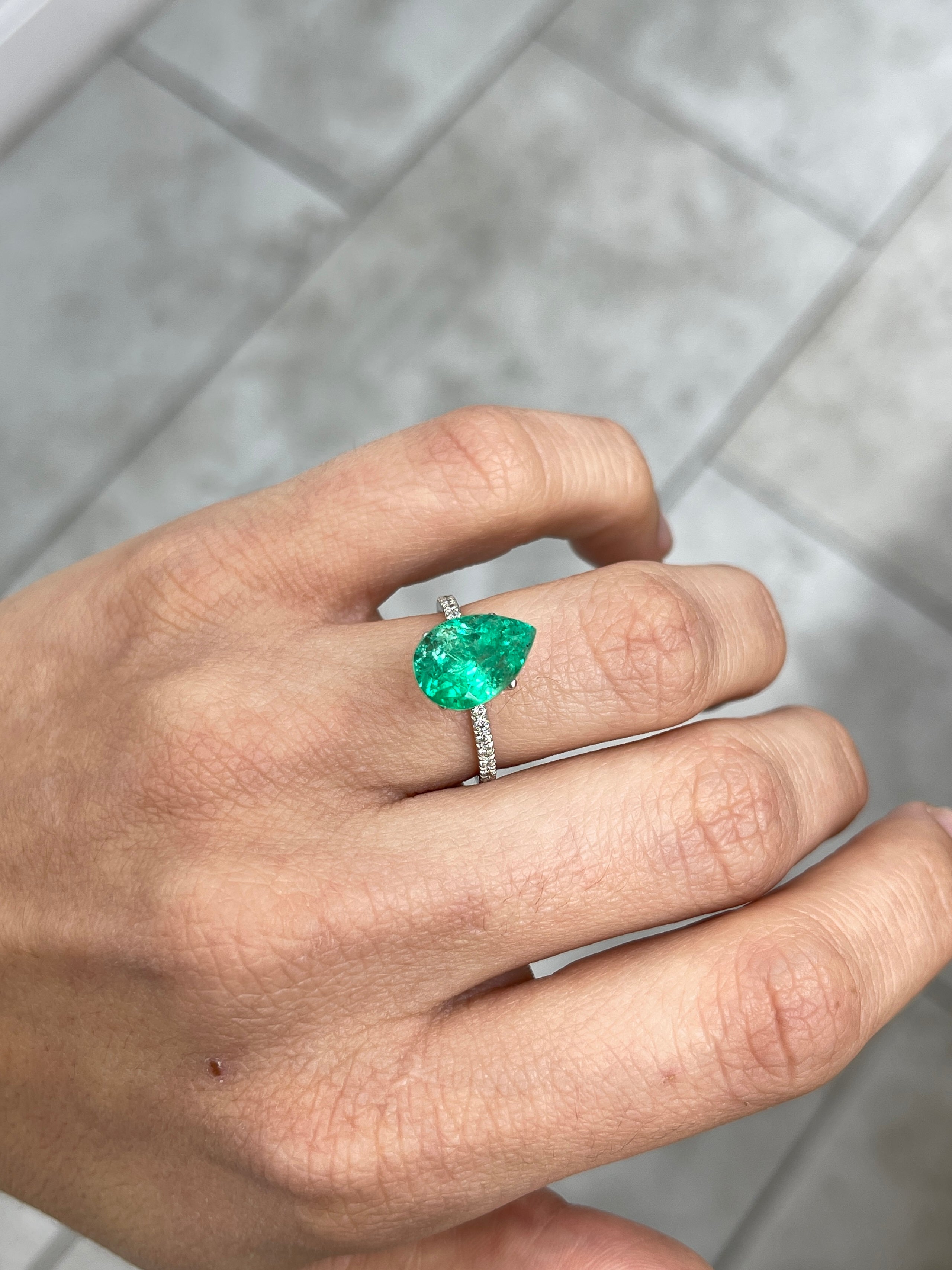 4.09 Carat 12x9 Freckled Bluish Green Pear Loose Colombian Emerald - JR Colombian Emeralds