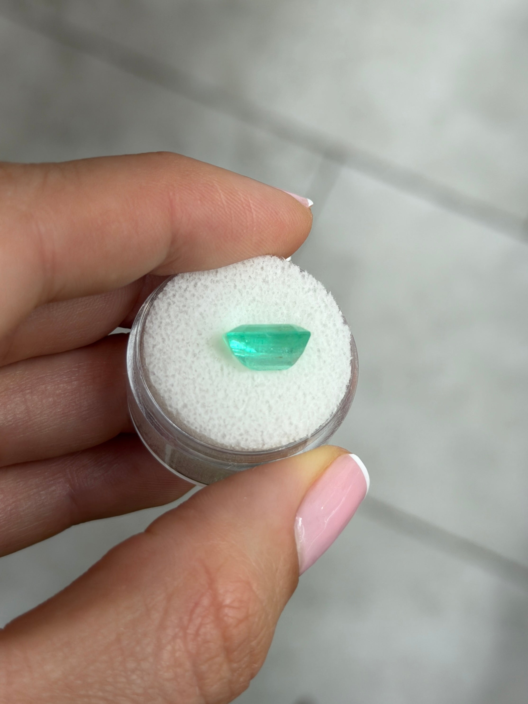 4.12 carat medium light bluish green Colombian emerald loose gemstone with chunky emerald cut, natural and vibrant.