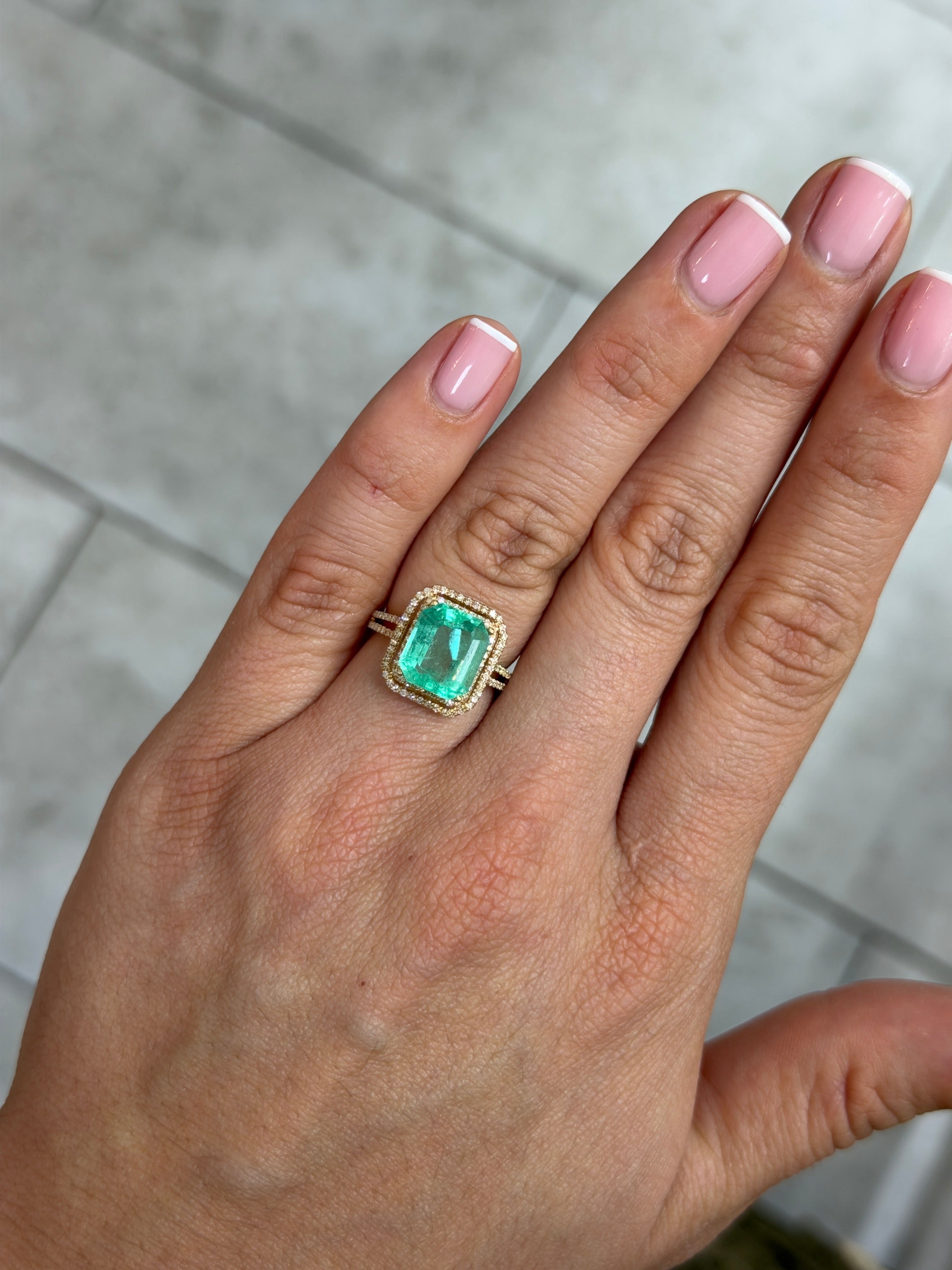 4.12 carat medium light bluish green natural Colombian emerald in chunky emerald cut, loose gemstone from JR Colombian Emeralds.