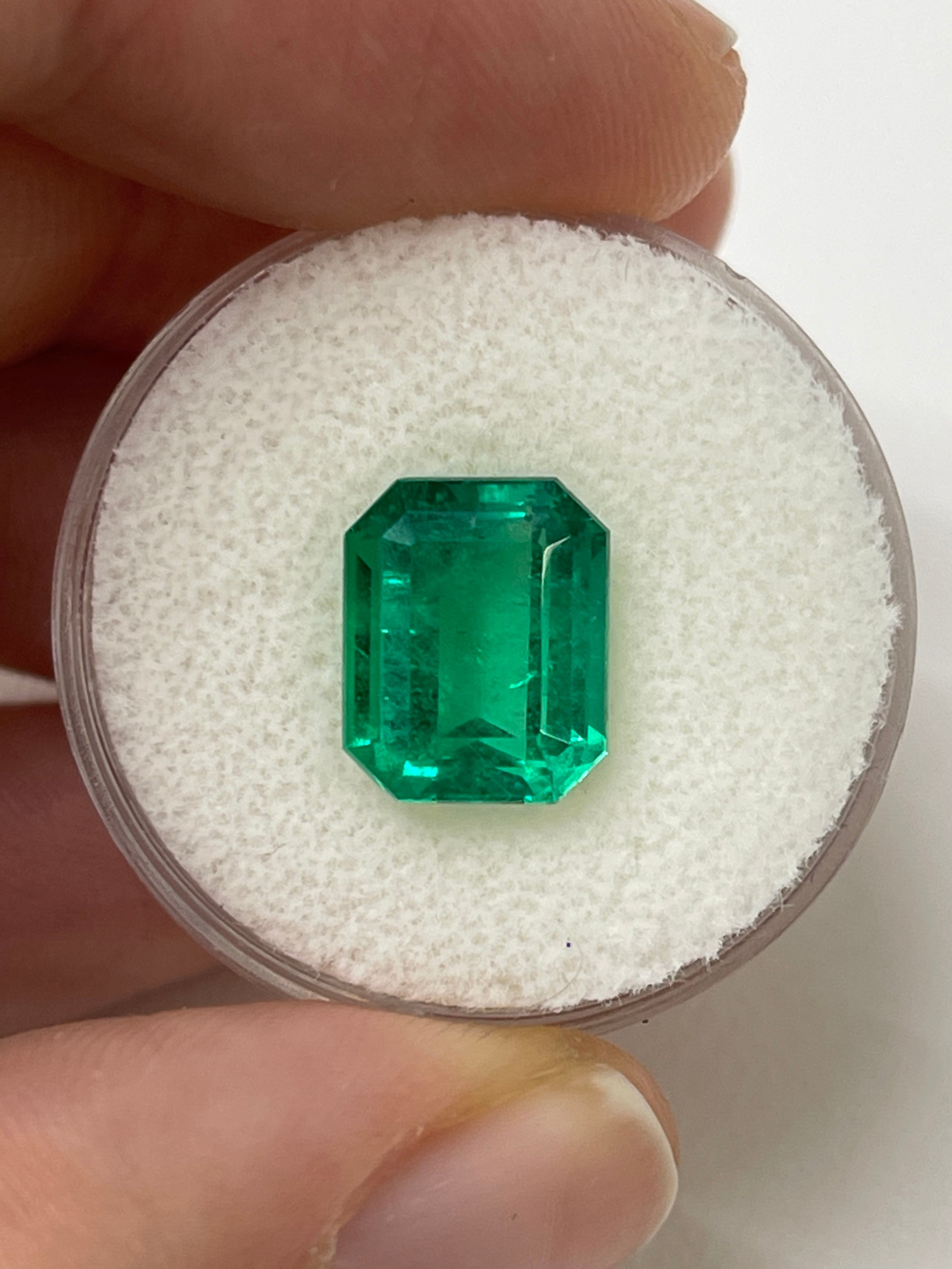 4.24 carat AAA+ Colombian emerald in classic 11x9 emerald cut, natural green loose gemstone from JR Colombian Emeralds