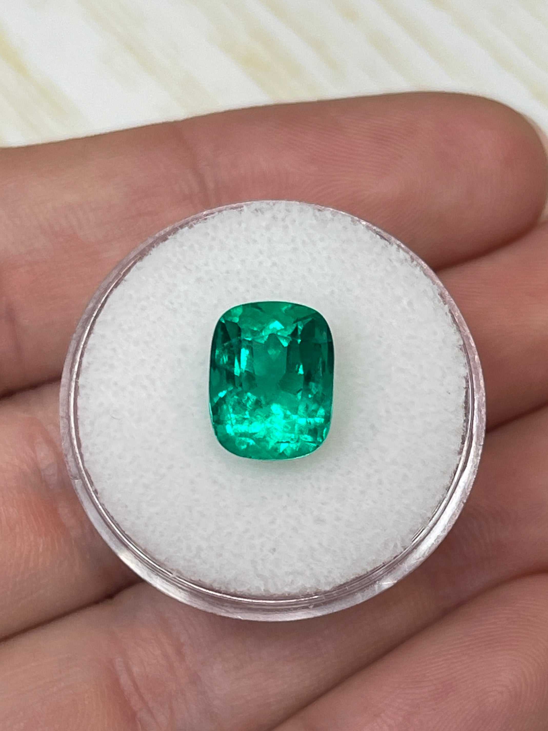 Vivid 4.38 Carat Muzo green Colombian emerald loose cushion cut gemstone from JR Colombian Emeralds.