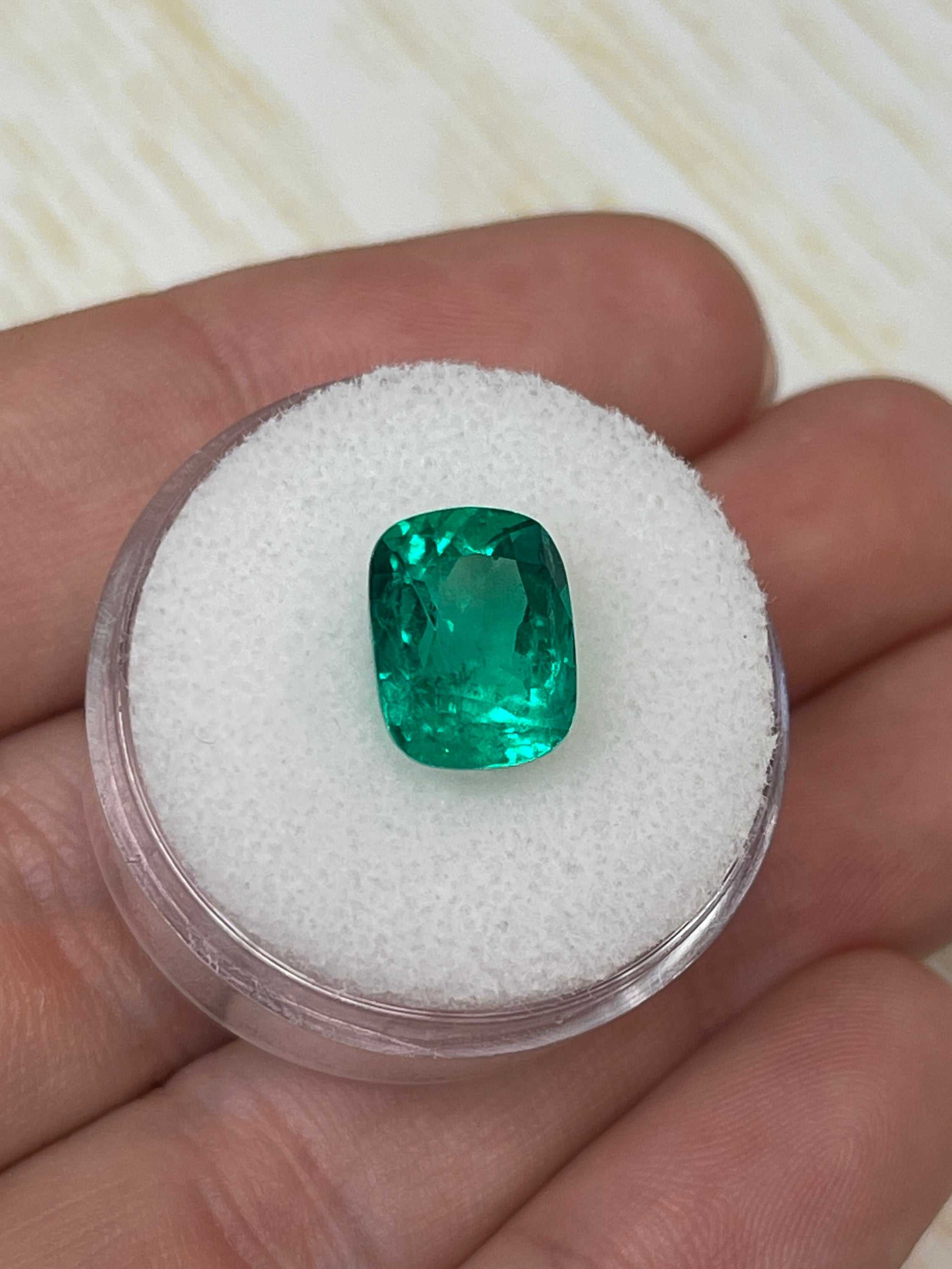Vivid 4.38 Carat Muzo green Colombian emerald loose cushion cut gemstone from JR Colombian Emeralds.