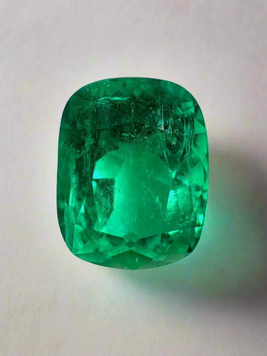 Vivid 4.38 carat Muzo green Colombian emerald loose cushion cut gemstone from JR Colombian Emeralds.