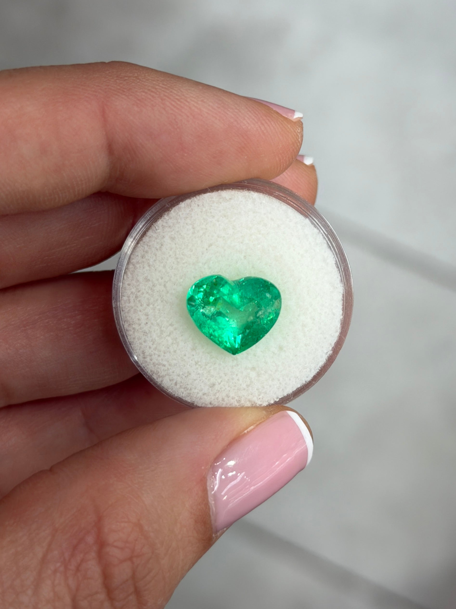 Natural 4.40 carat glowing green Colombian emerald loose heart cut gemstone by JR Colombian Emeralds.
