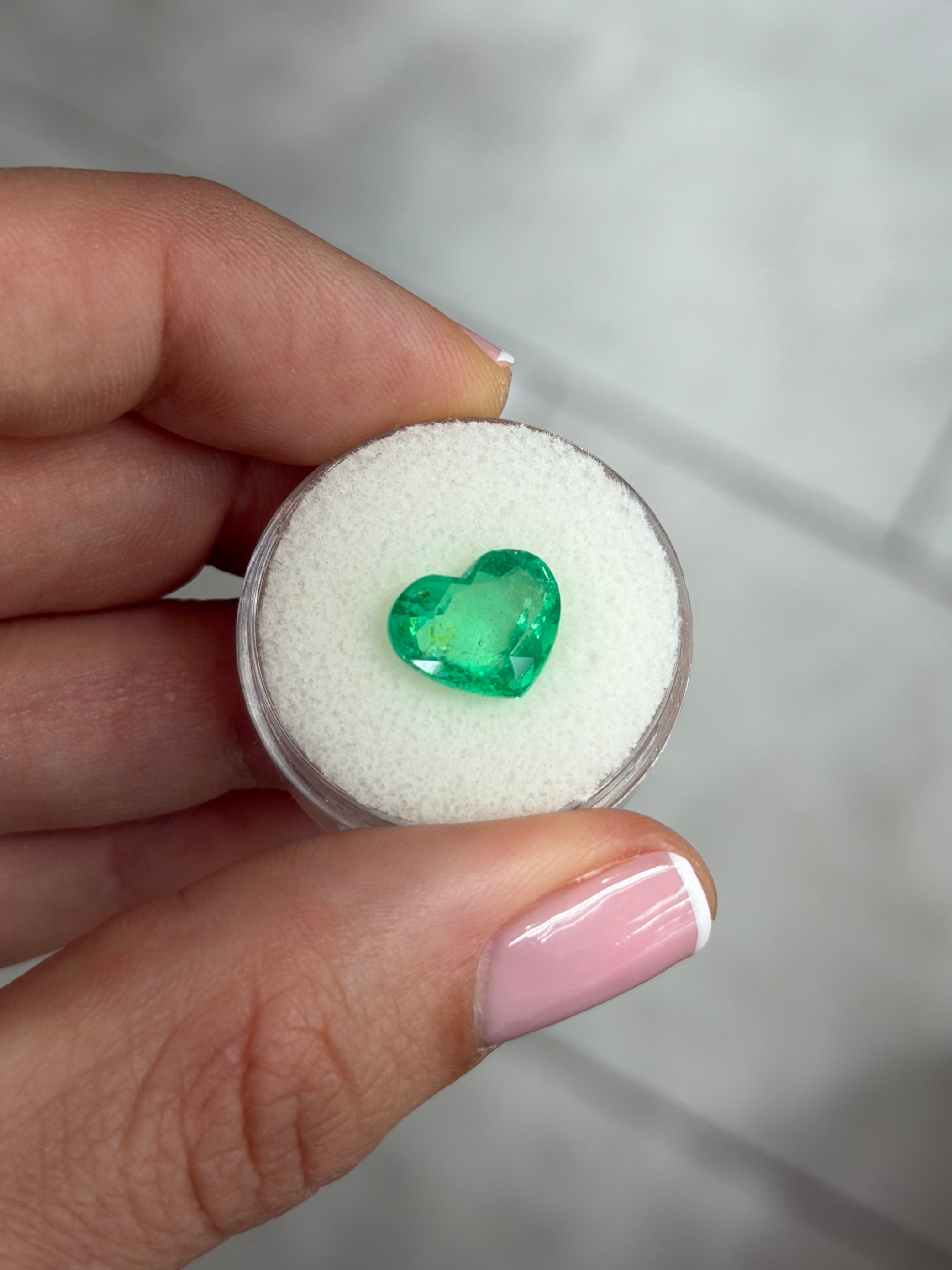 Natural 4.40 carat glowing green Colombian emerald loose heart cut gemstone by JR Colombian Emeralds.