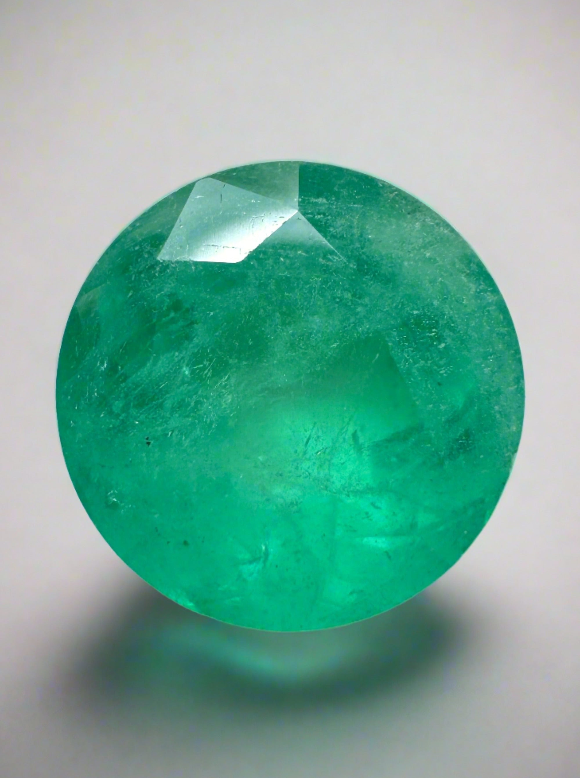 Medium green 4.42 carat natural round Colombian emerald loose gemstone from JR Colombian Emeralds.