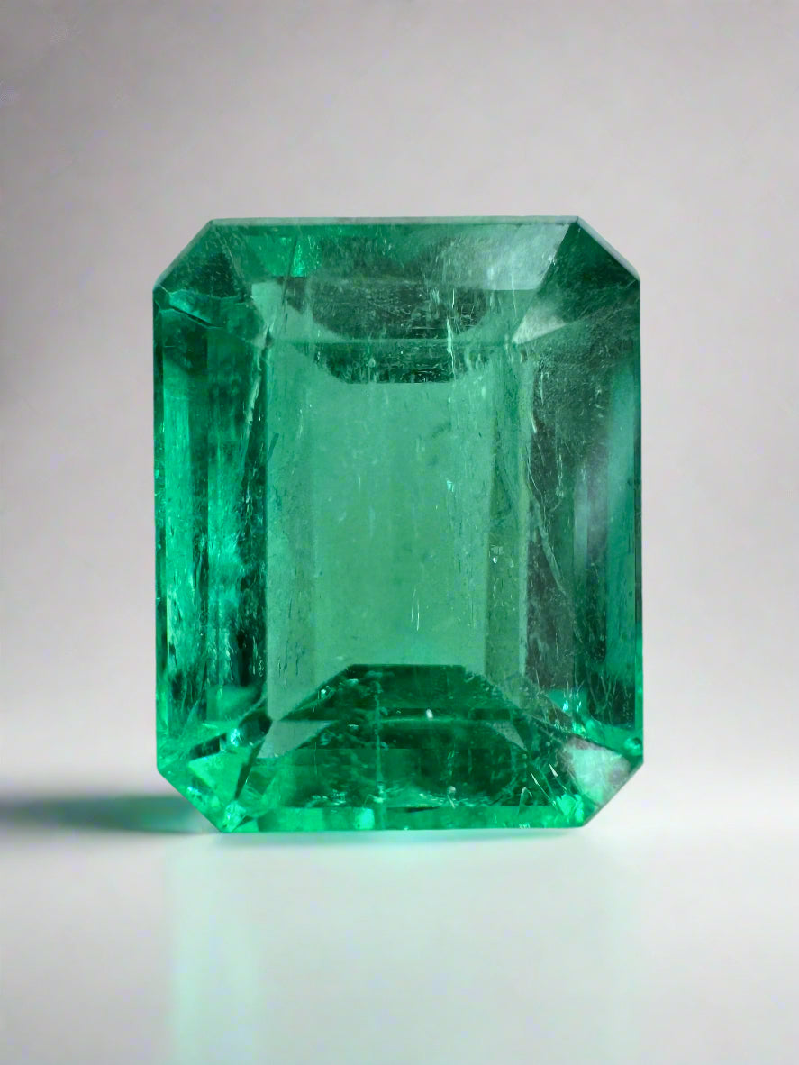 4.43 carat natural Colombian emerald loose gemstone with an emerald cut, showcasing vibrant Jyotish green color from JR Colombian Emeralds