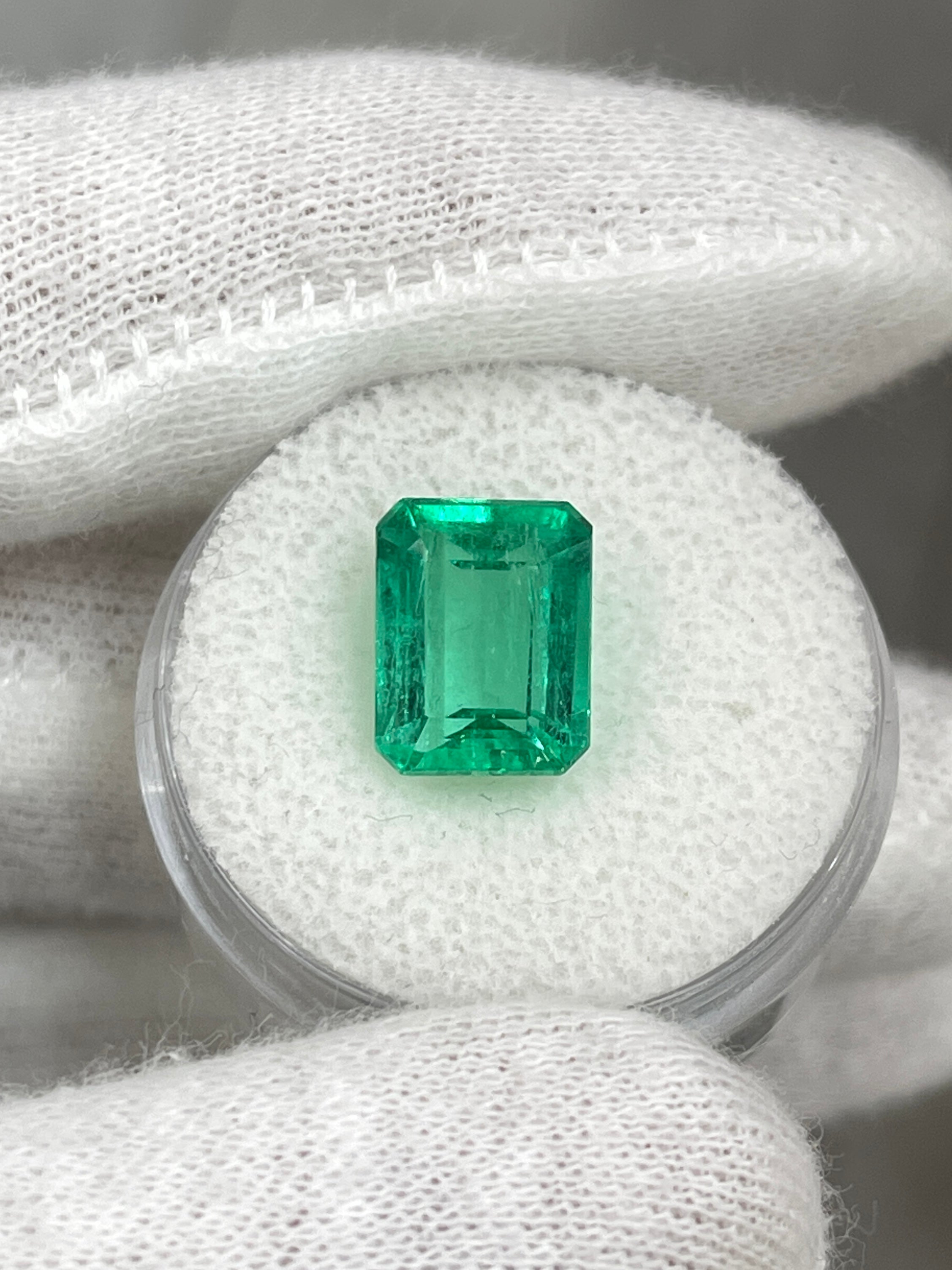 4.43 carat Jyotish green Colombian emerald loose gemstone in 11x9 mm emerald cut, natural and vibrant from JR Colombian Emeralds.
