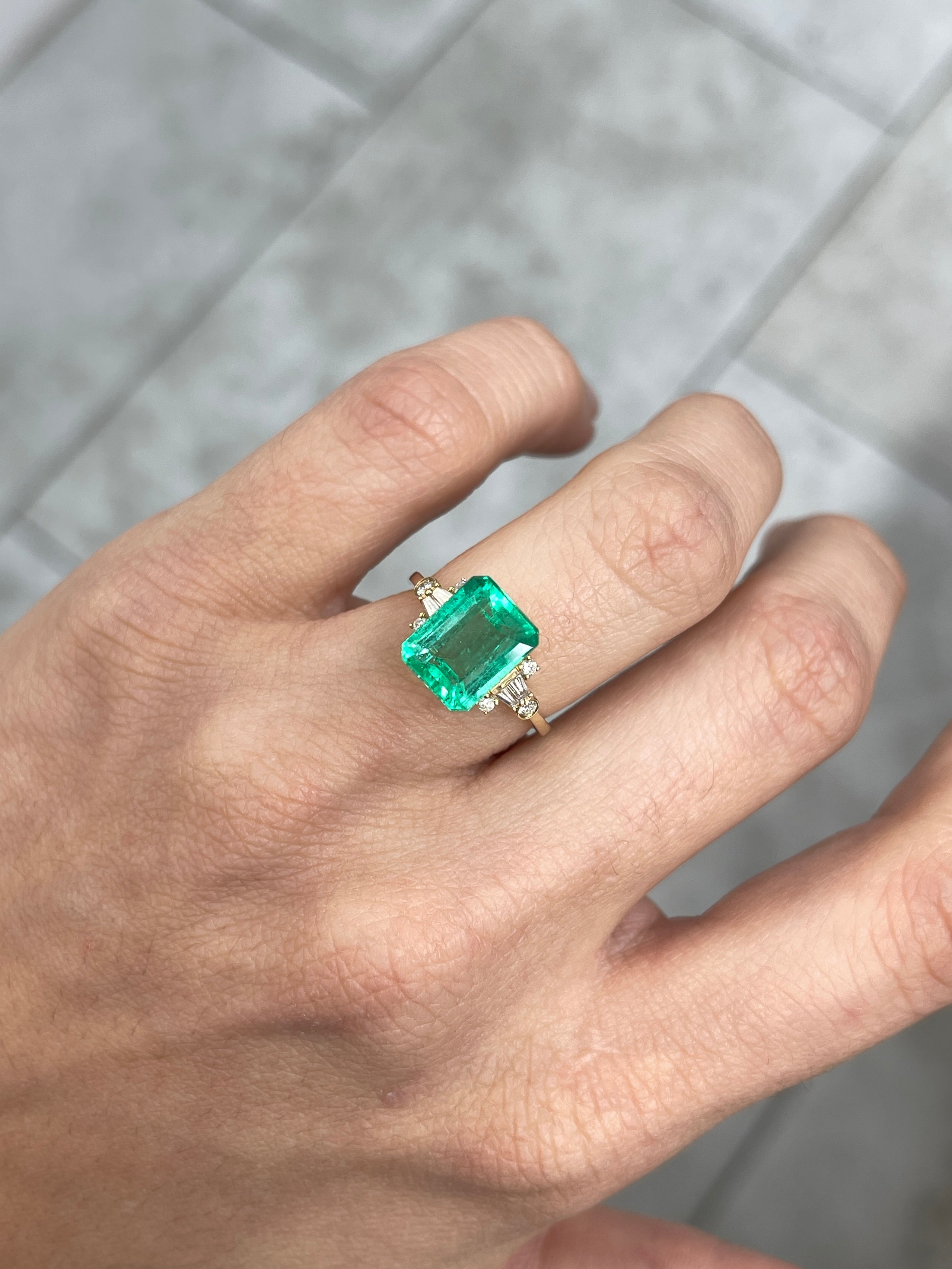 Natural 4.43 carat Jyotish green Colombian emerald loose gemstone in an emerald cut, showcasing vibrant color and clarity.