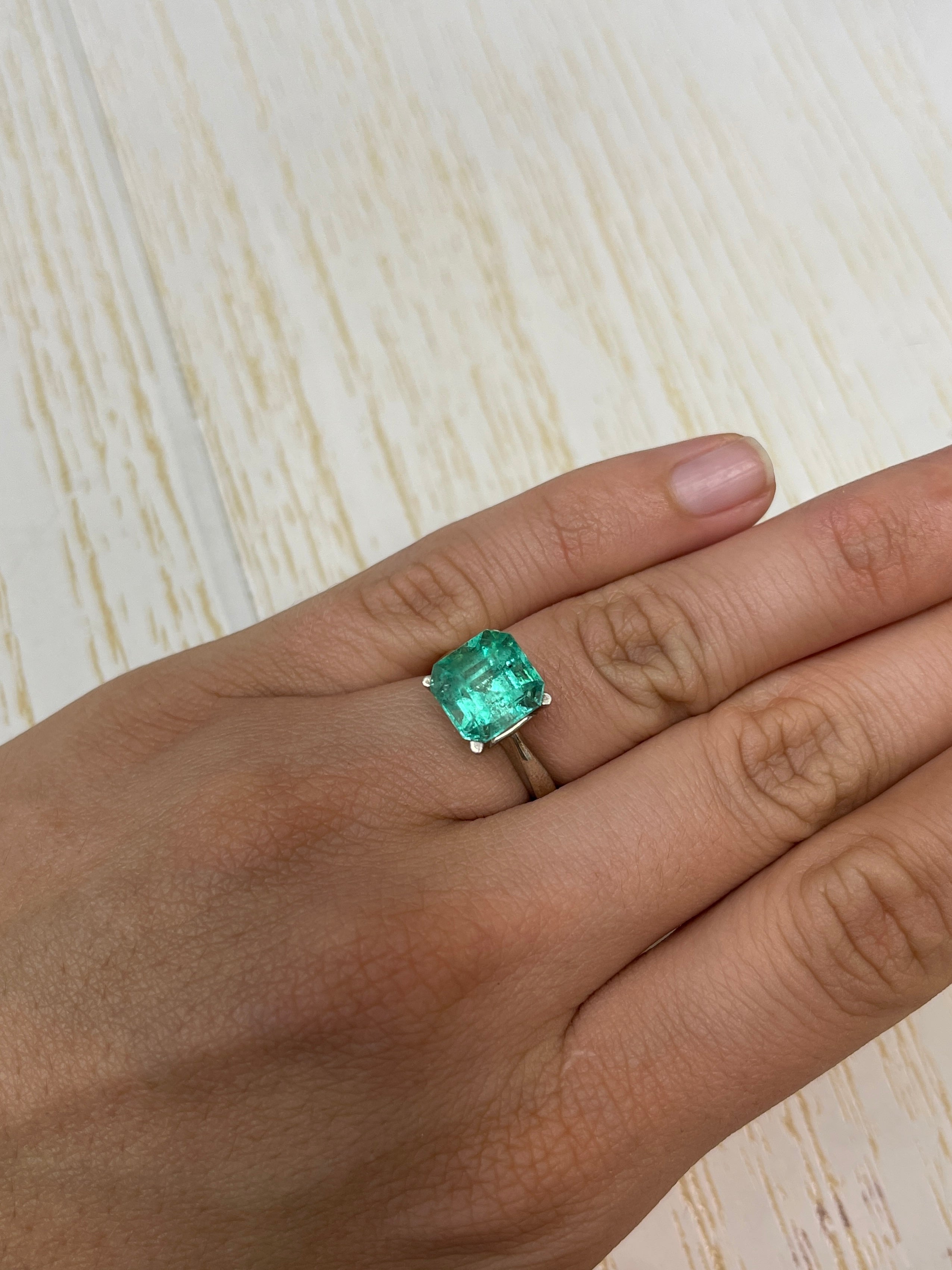 4.69 carat Colombian Emerald loose gemstone, Asscher cut with clipped corners, featuring natural freckled inclusions, by JR Colombian Emeralds.