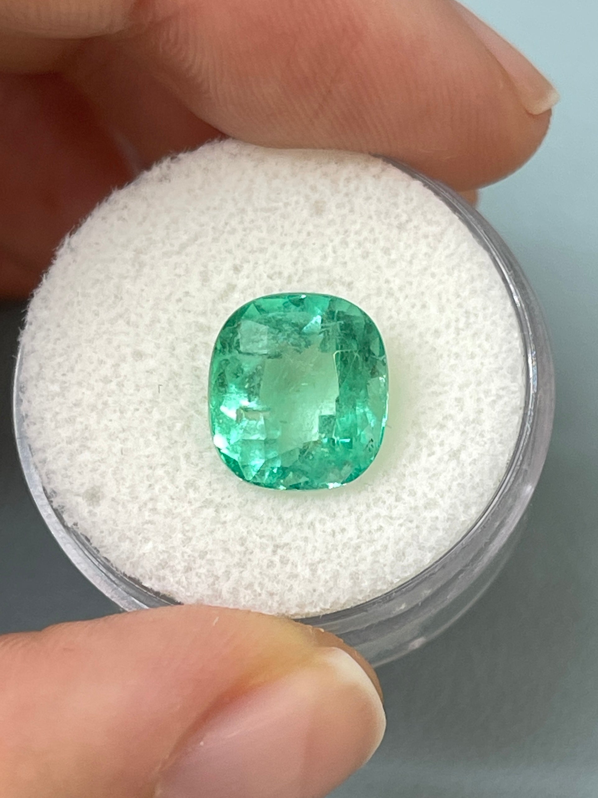 Light green 4.71 carat natural Colombian emerald loose gemstone, cushion cut, from JR Colombian Emeralds.