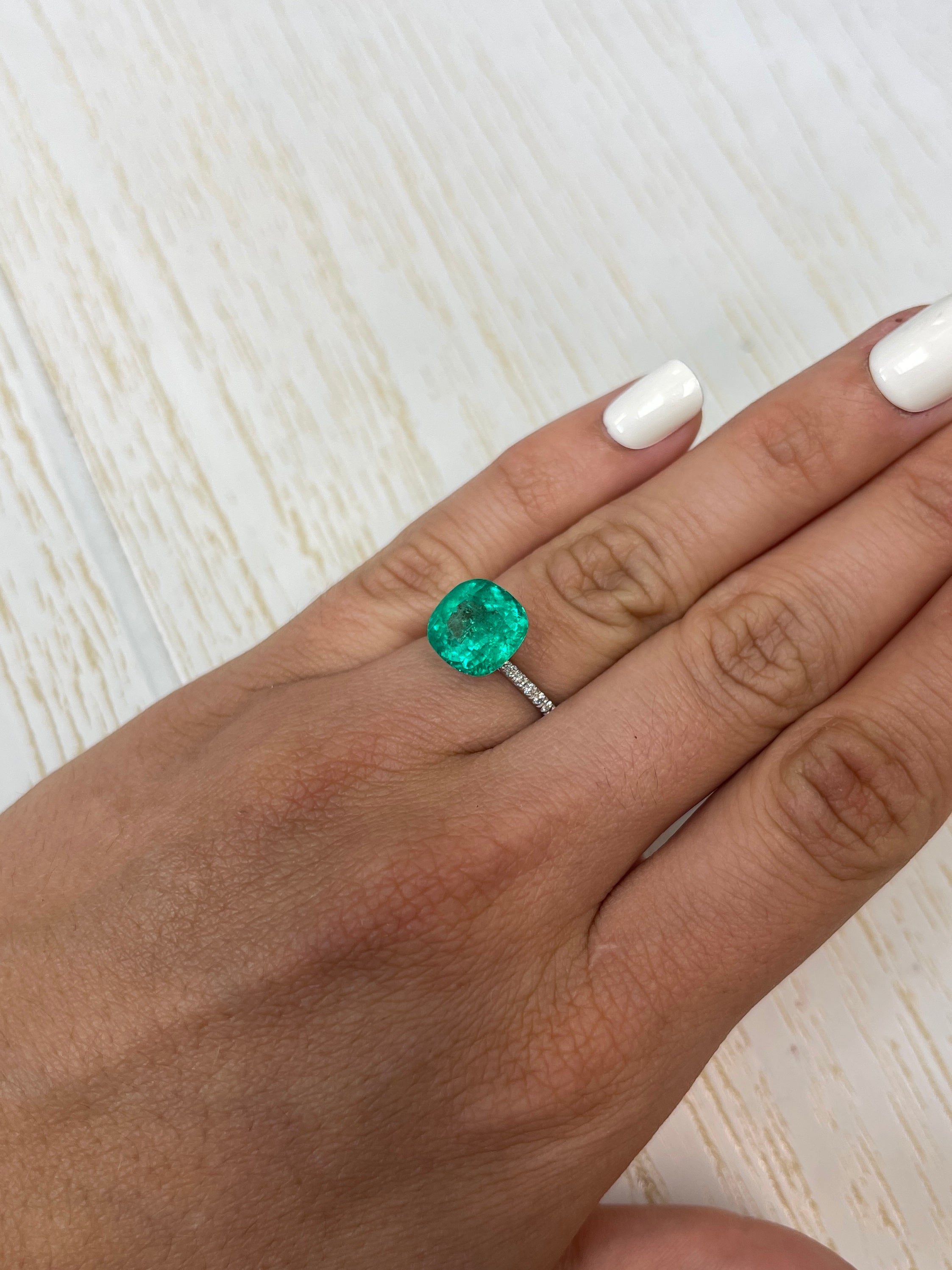 Vivid bluish green 4.75 carat Colombian emerald loose cushion cut gemstone by JR Colombian Emeralds.