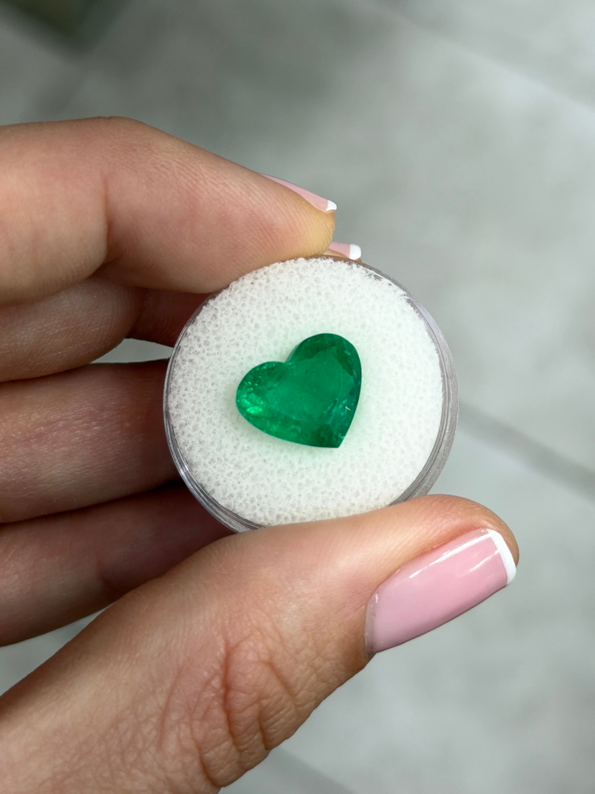 4.79 carat AAA+ intense green natural Colombian emerald heart cut loose gemstone by JR Colombian Emeralds.